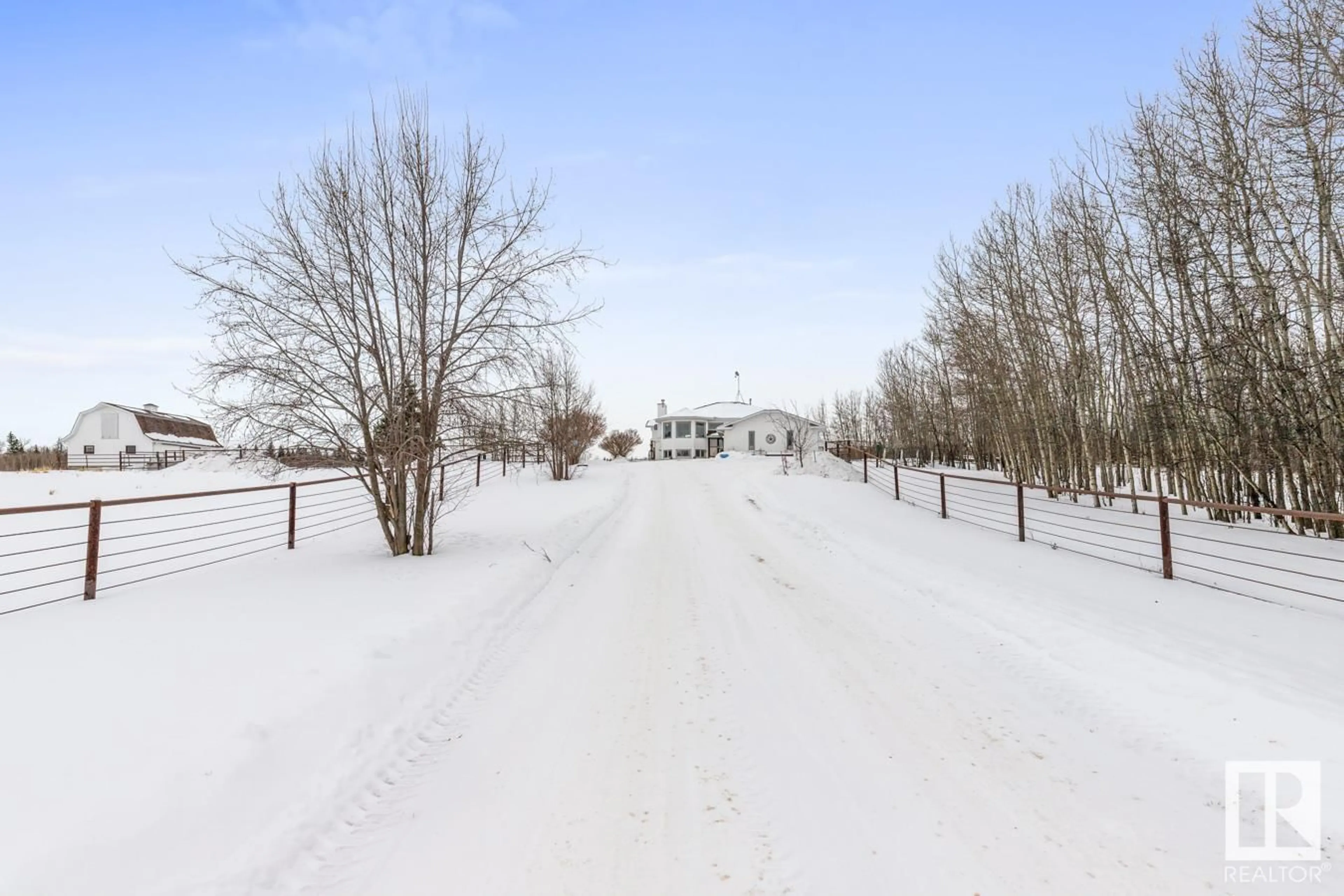 A pic from outside/outdoor area/front of a property/back of a property/a pic from drone, unknown for #25 51047 RR 221, Rural Strathcona County Alberta T8E1G8