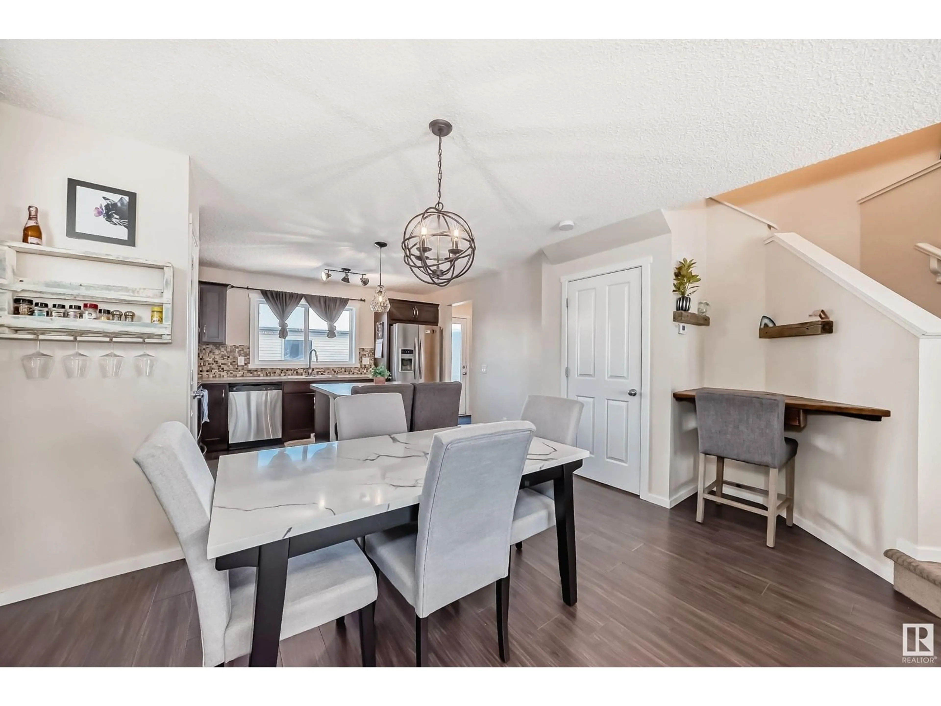 Open concept kitchen, wood/laminate floor for 2900 MAPLE WY NW, Edmonton Alberta T6T0T4