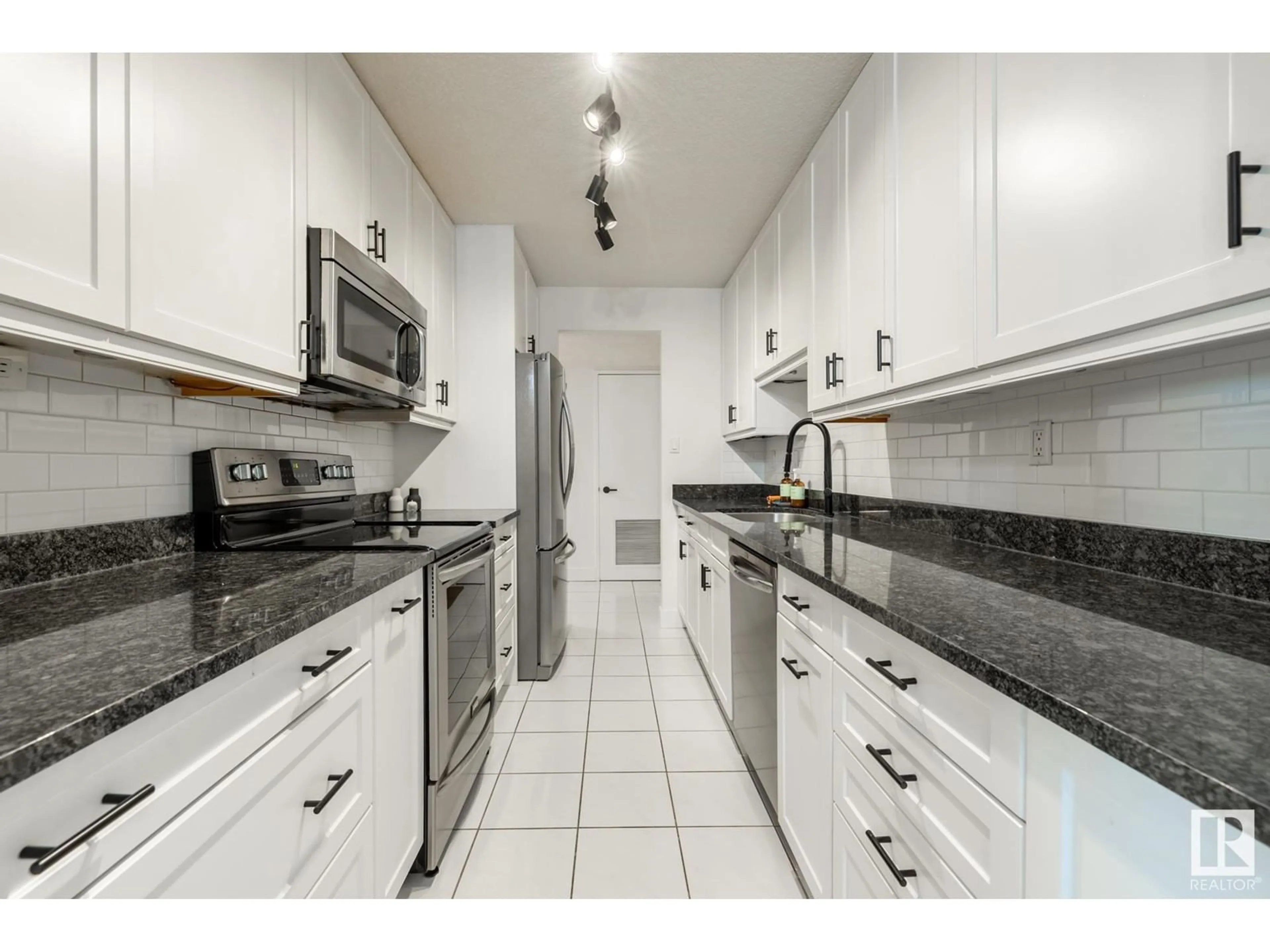 Standard kitchen, ceramic/tile floor for #203 12303 JASPER AV NW, Edmonton Alberta T5N3K7