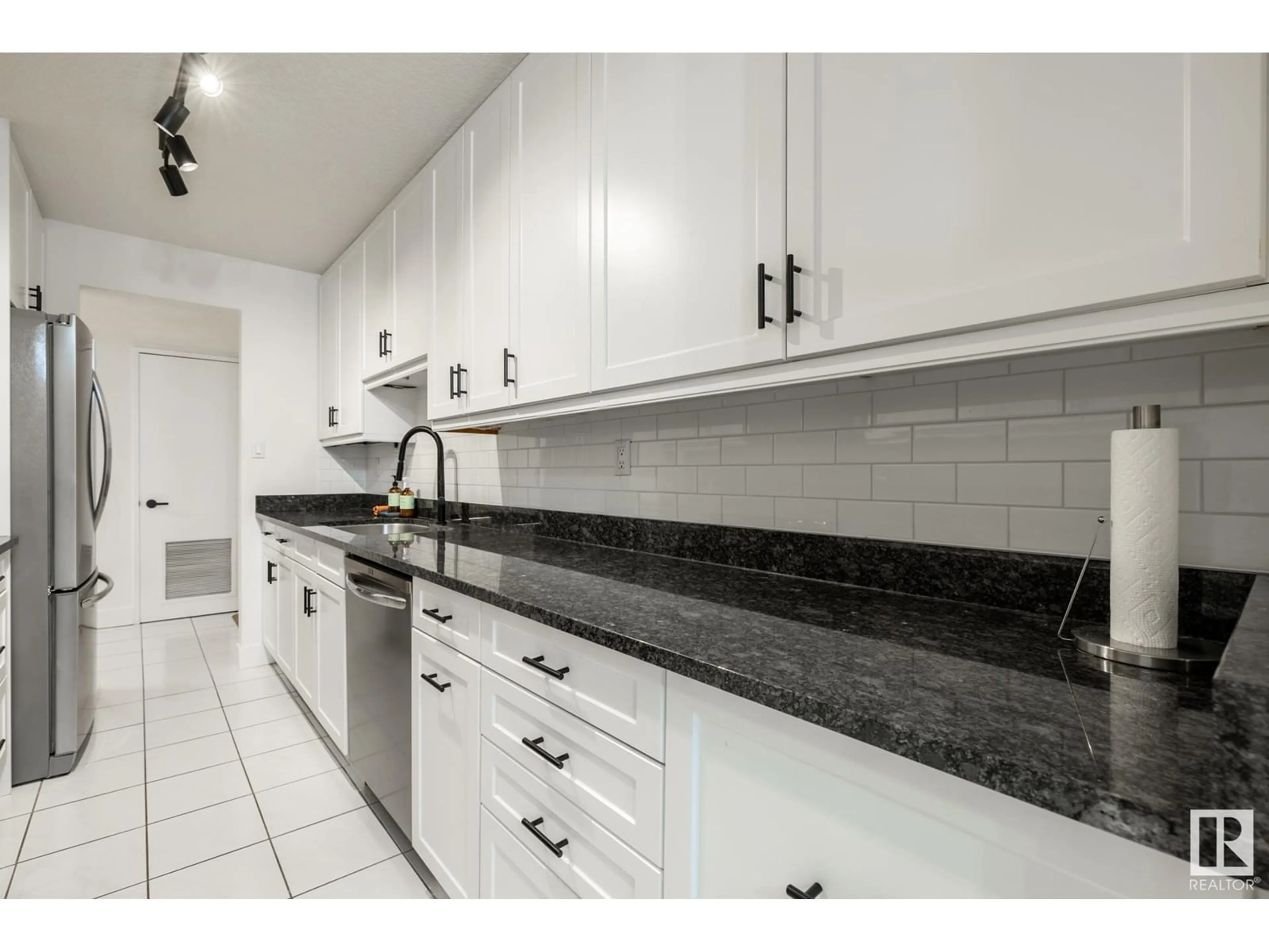 Standard kitchen, ceramic/tile floor for #203 12303 JASPER AV NW, Edmonton Alberta T5N3K7