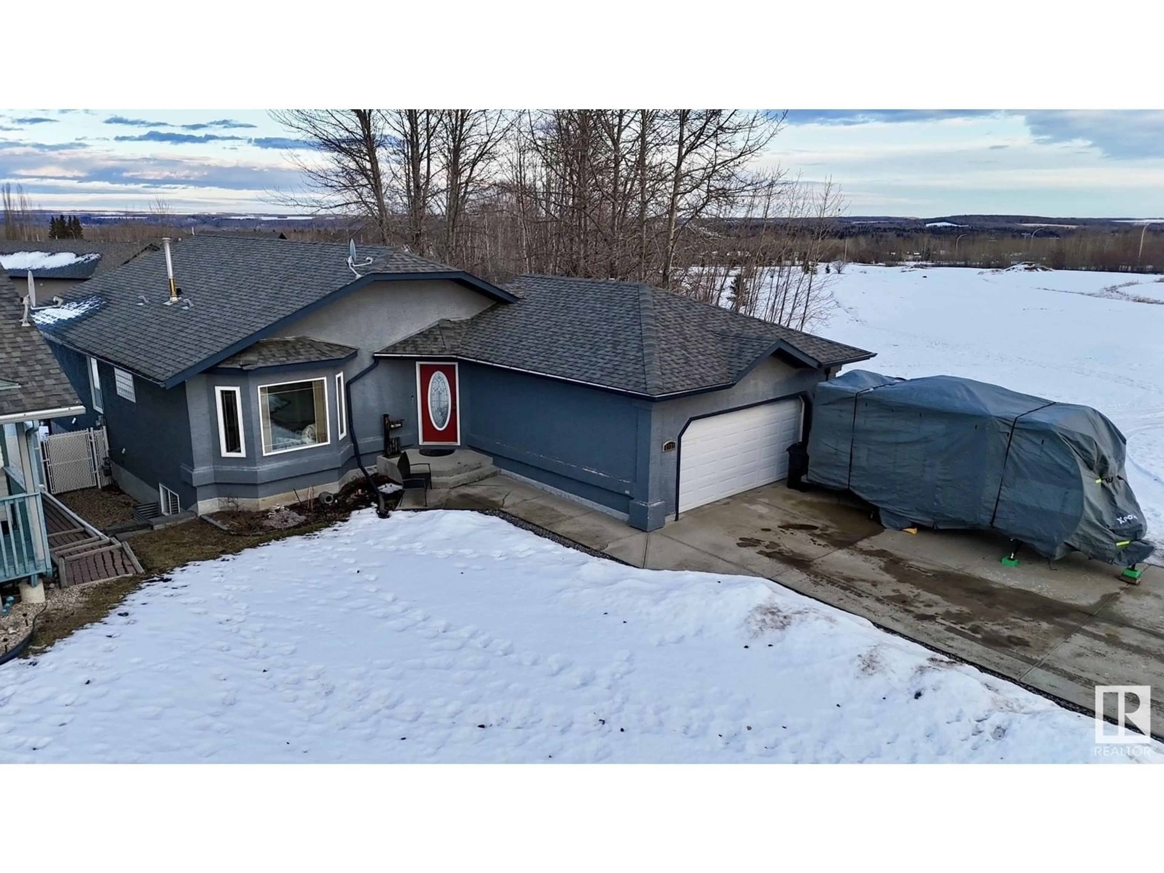 A pic from outside/outdoor area/front of a property/back of a property/a pic from drone, water/lake/river/ocean view for 4333 Beckett Rd, Drayton Valley Alberta T7A1T8