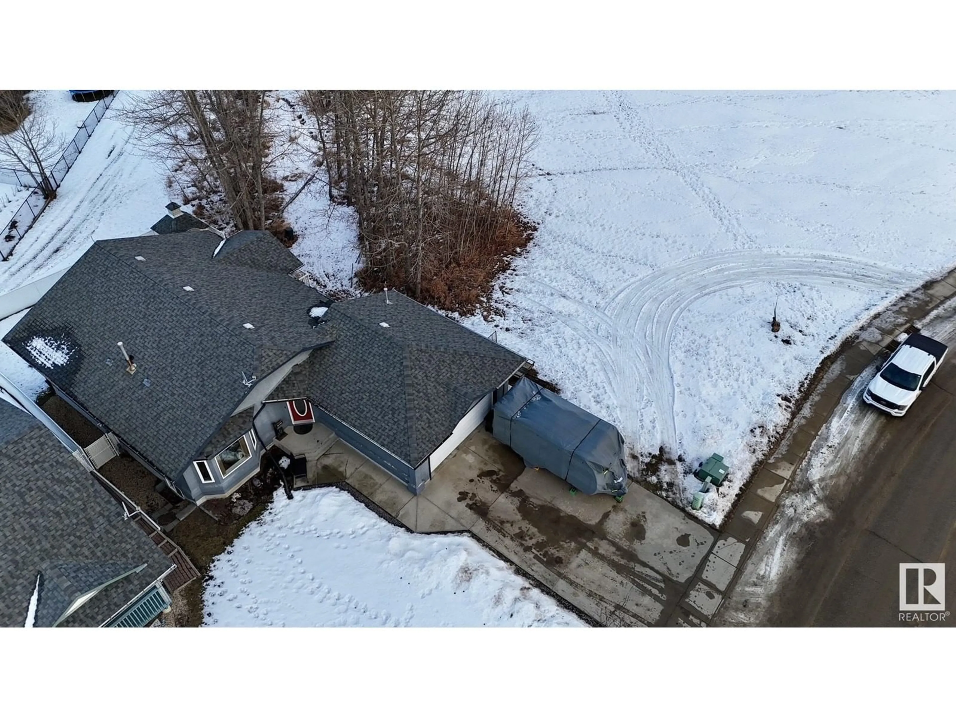 A pic from outside/outdoor area/front of a property/back of a property/a pic from drone, unknown for 4333 Beckett Rd, Drayton Valley Alberta T7A1T8