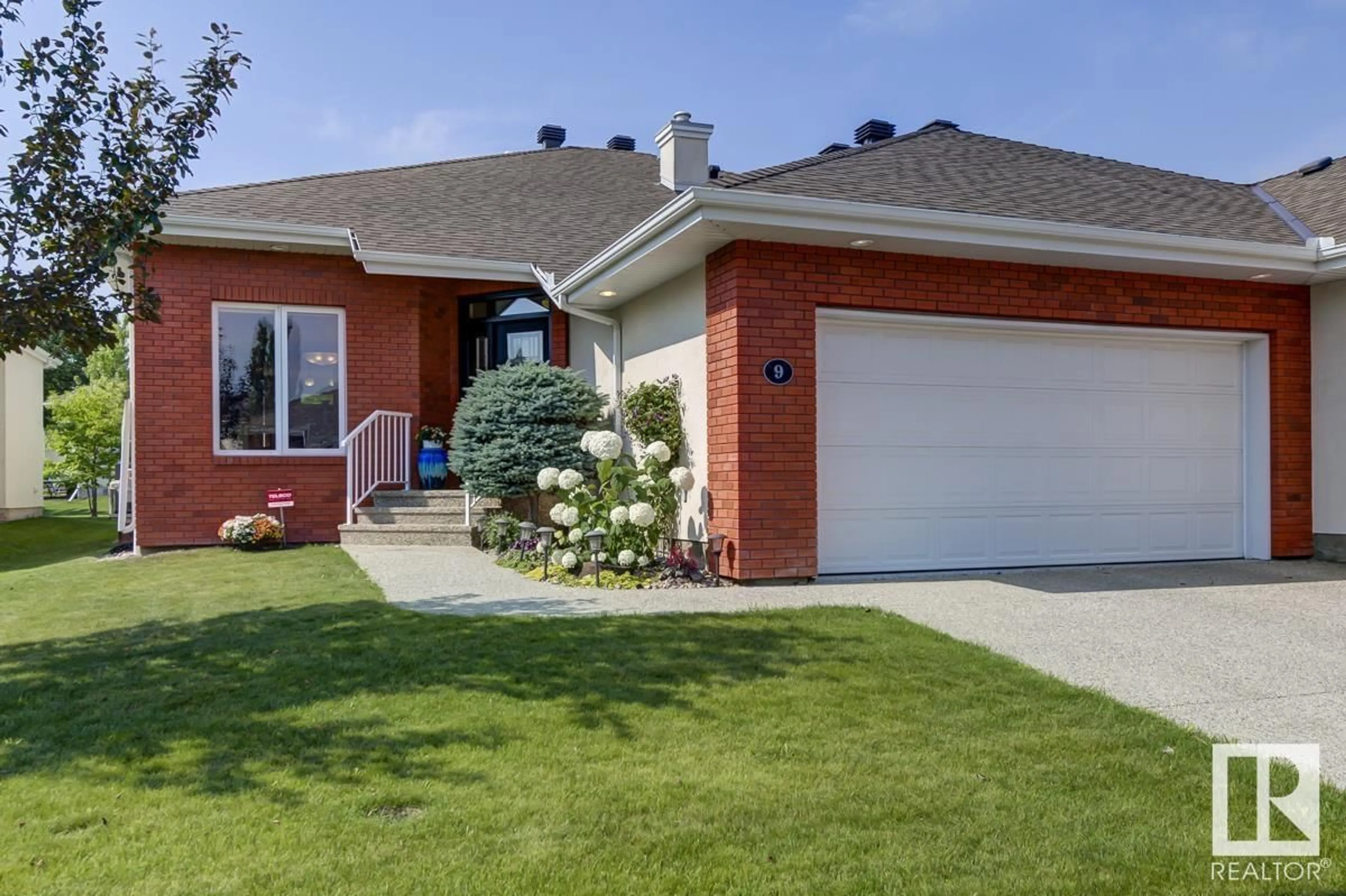 Home with brick exterior material, street for #9 1225 WANYANDI RD NW, Edmonton Alberta T6M2W7