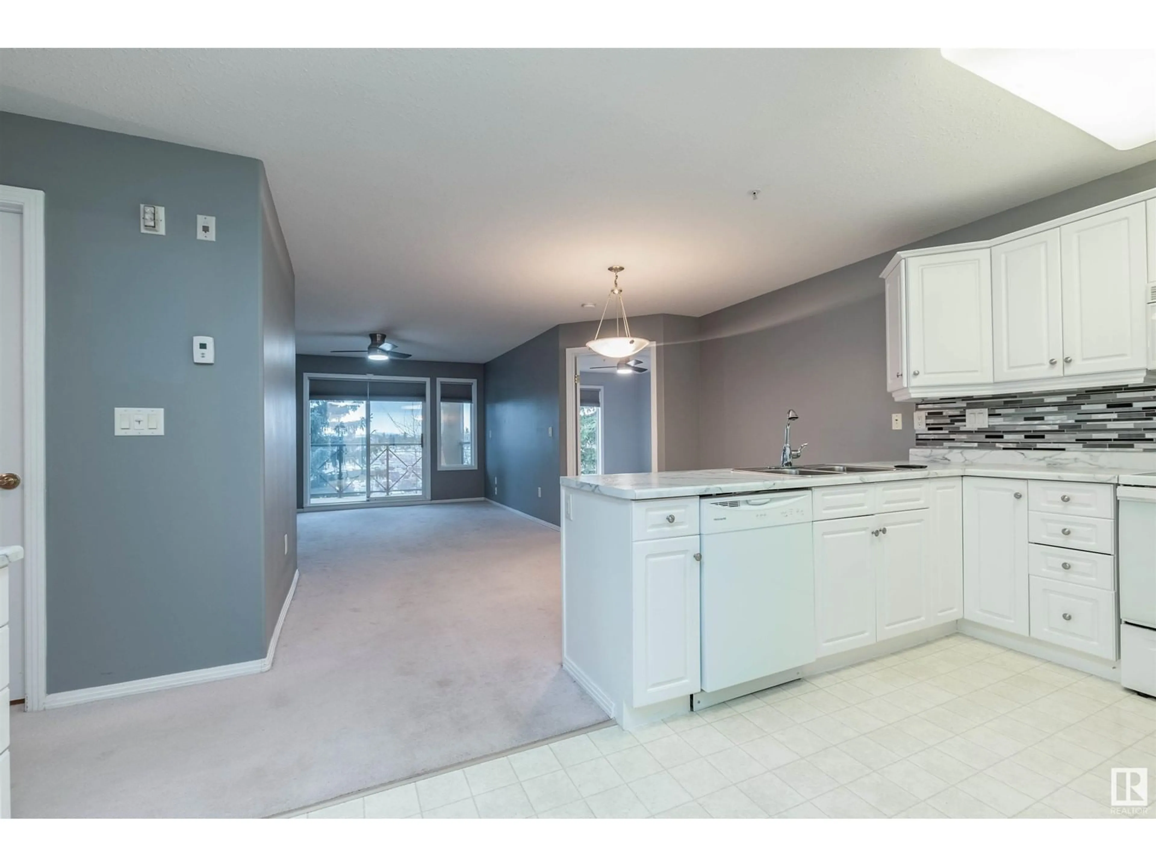 Open concept kitchen, unknown for #307 8922 156 ST NW, Edmonton Alberta T5R5Z3