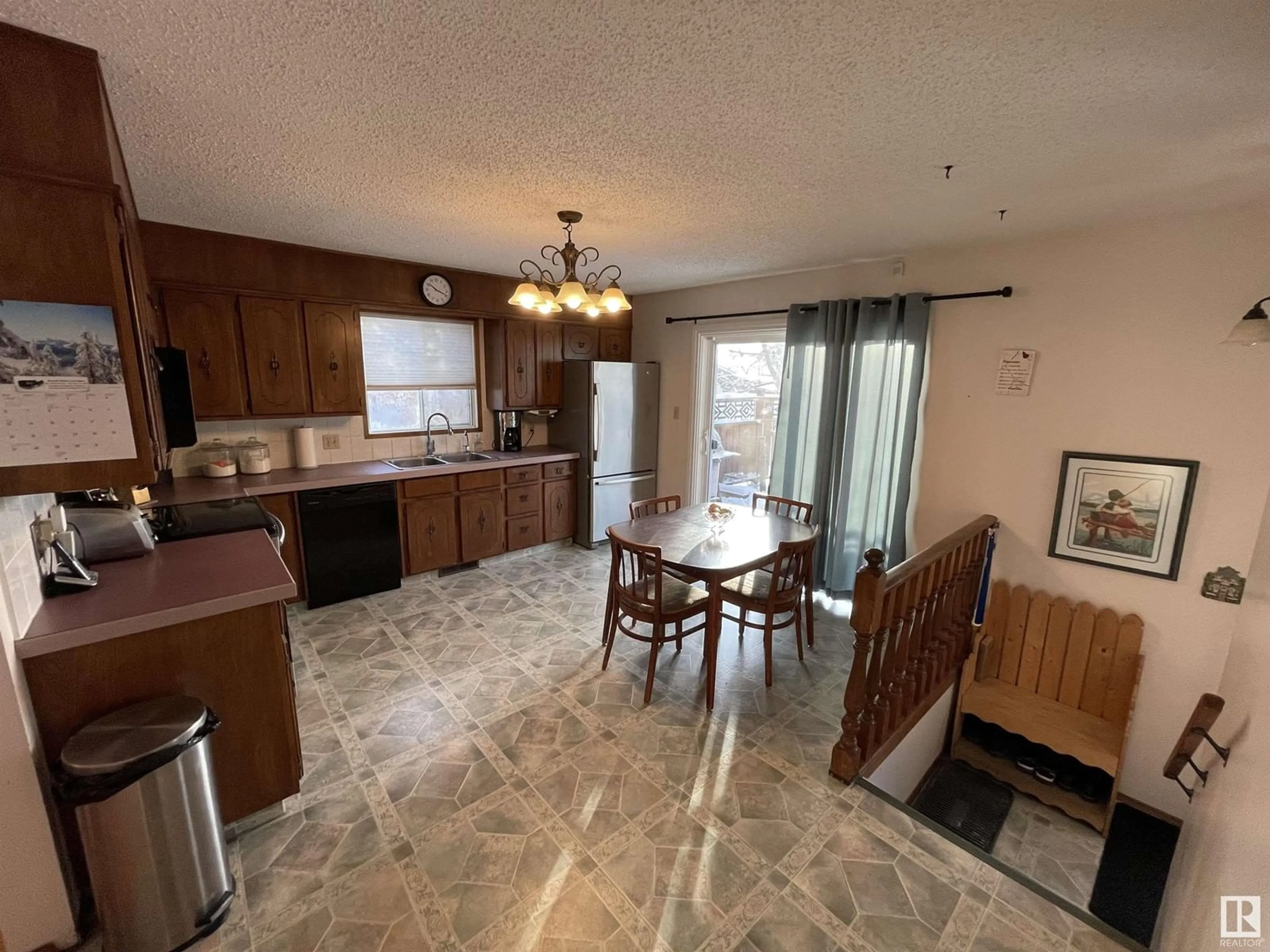 Open concept kitchen, ceramic/tile floor for 4108 45 AV, Bonnyville Town Alberta T9N1J3