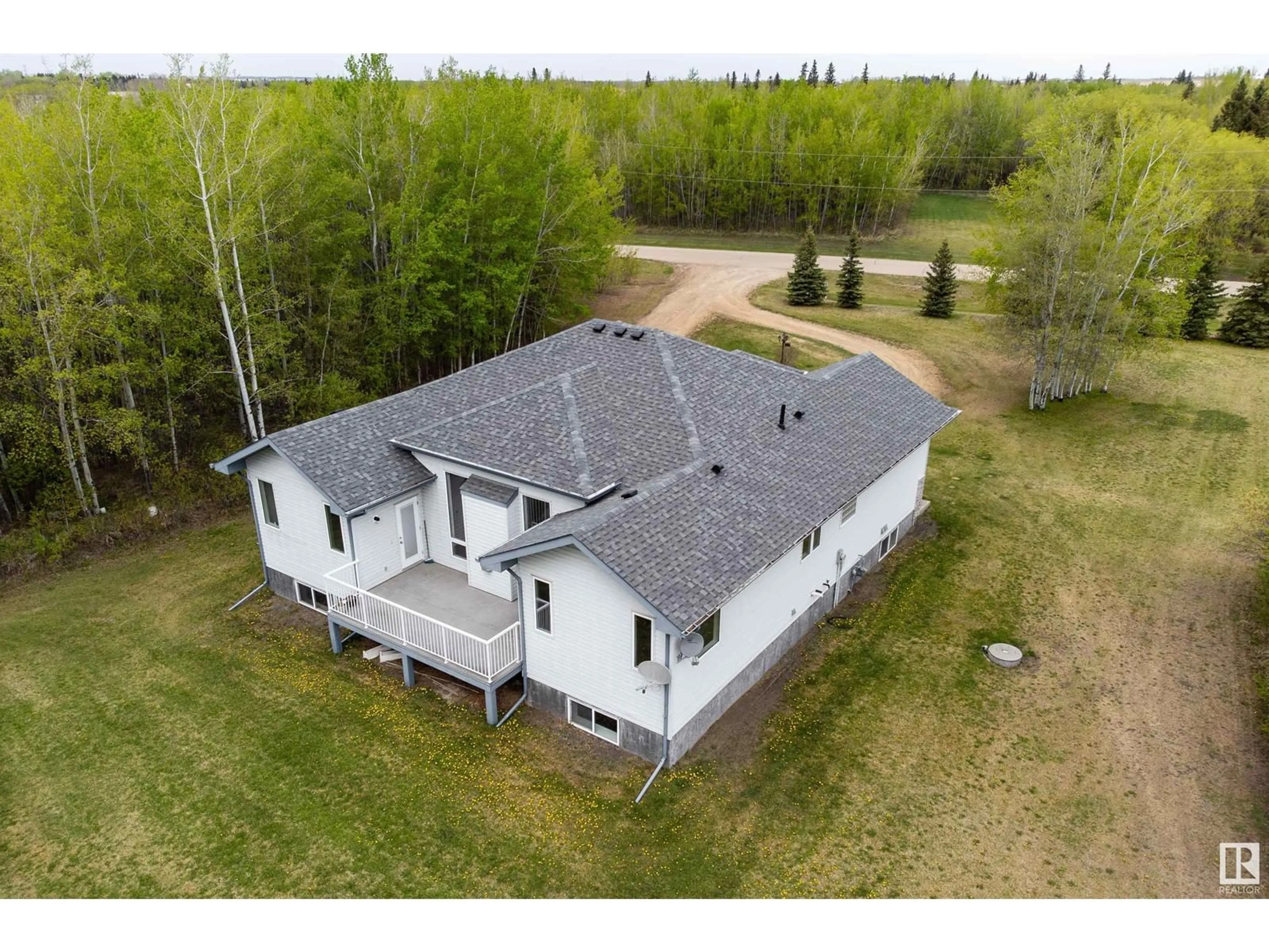 A pic from outside/outdoor area/front of a property/back of a property/a pic from drone, building for 30 50210 RGE ROAD 244, Rural Leduc County Alberta T4X0N9