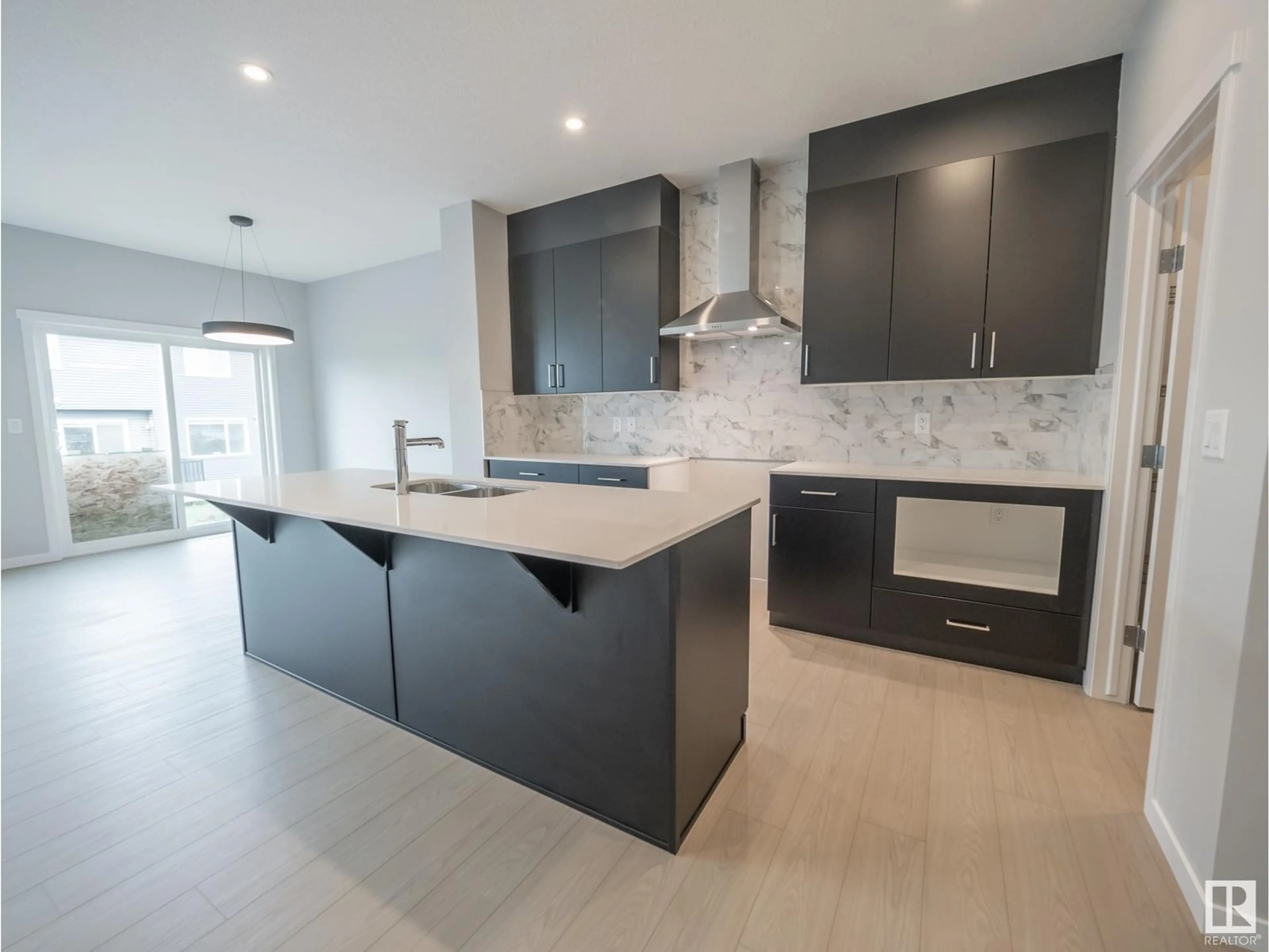 Open concept kitchen, ceramic/tile floor for 520 173 AV NE, Edmonton Alberta T5Y4G2