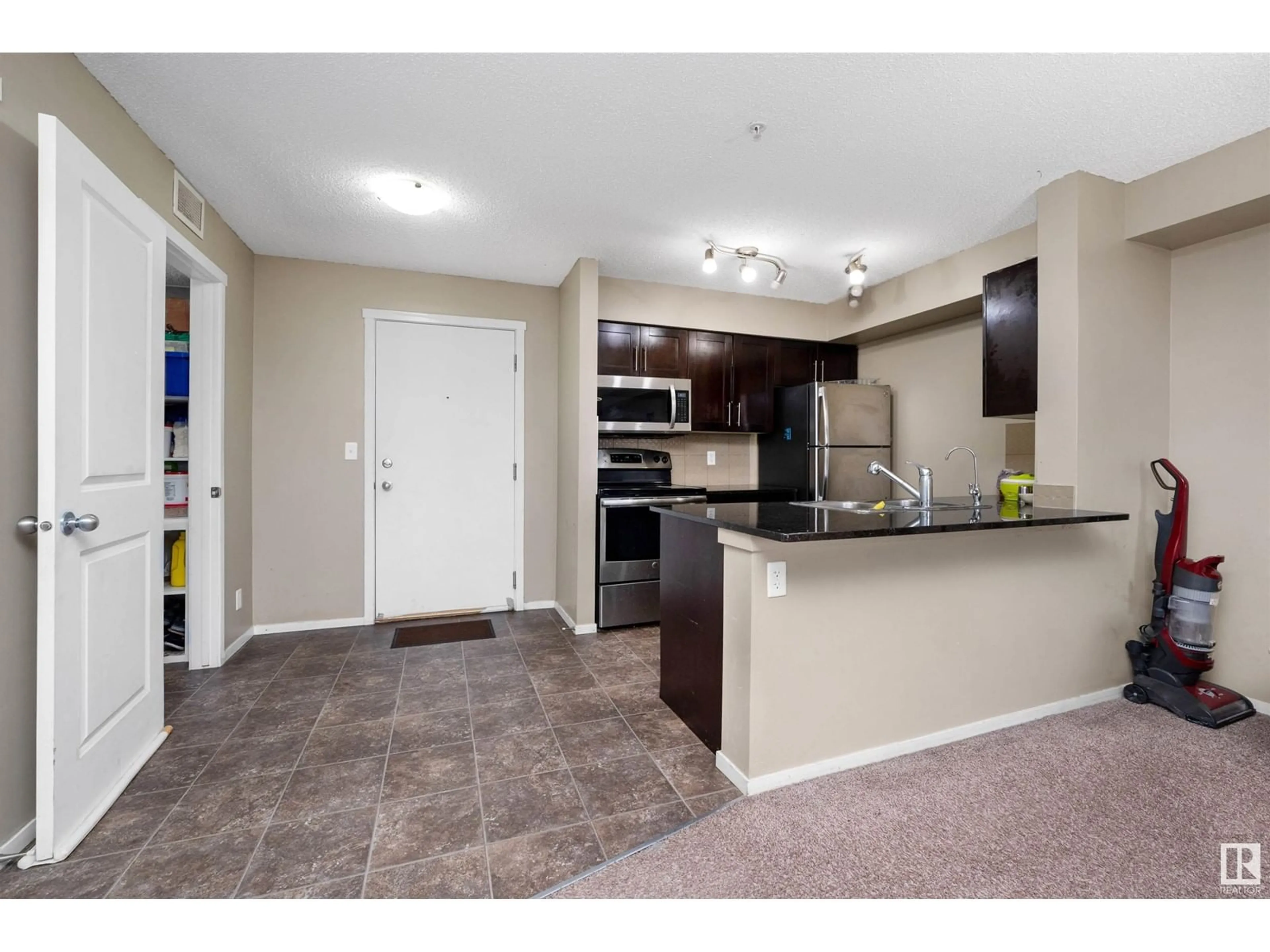 Standard kitchen, unknown for #204 3315 JAMES MOWATT TR SW, Edmonton Alberta T6W3L9