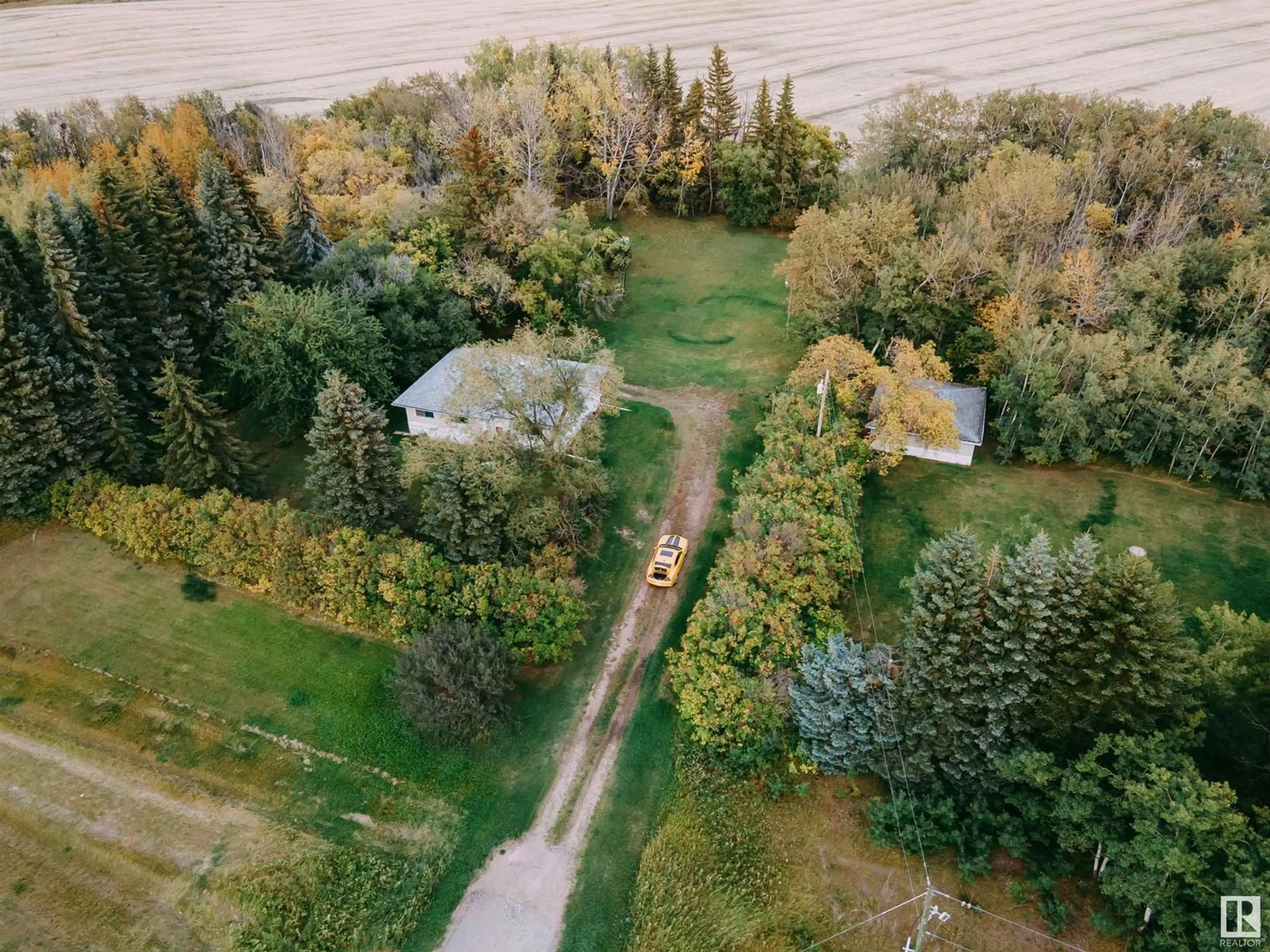 A pic from outside/outdoor area/front of a property/back of a property/a pic from drone, forest/trees view for 50327 36 HI, Rural Minburn County Alberta T0B2S0