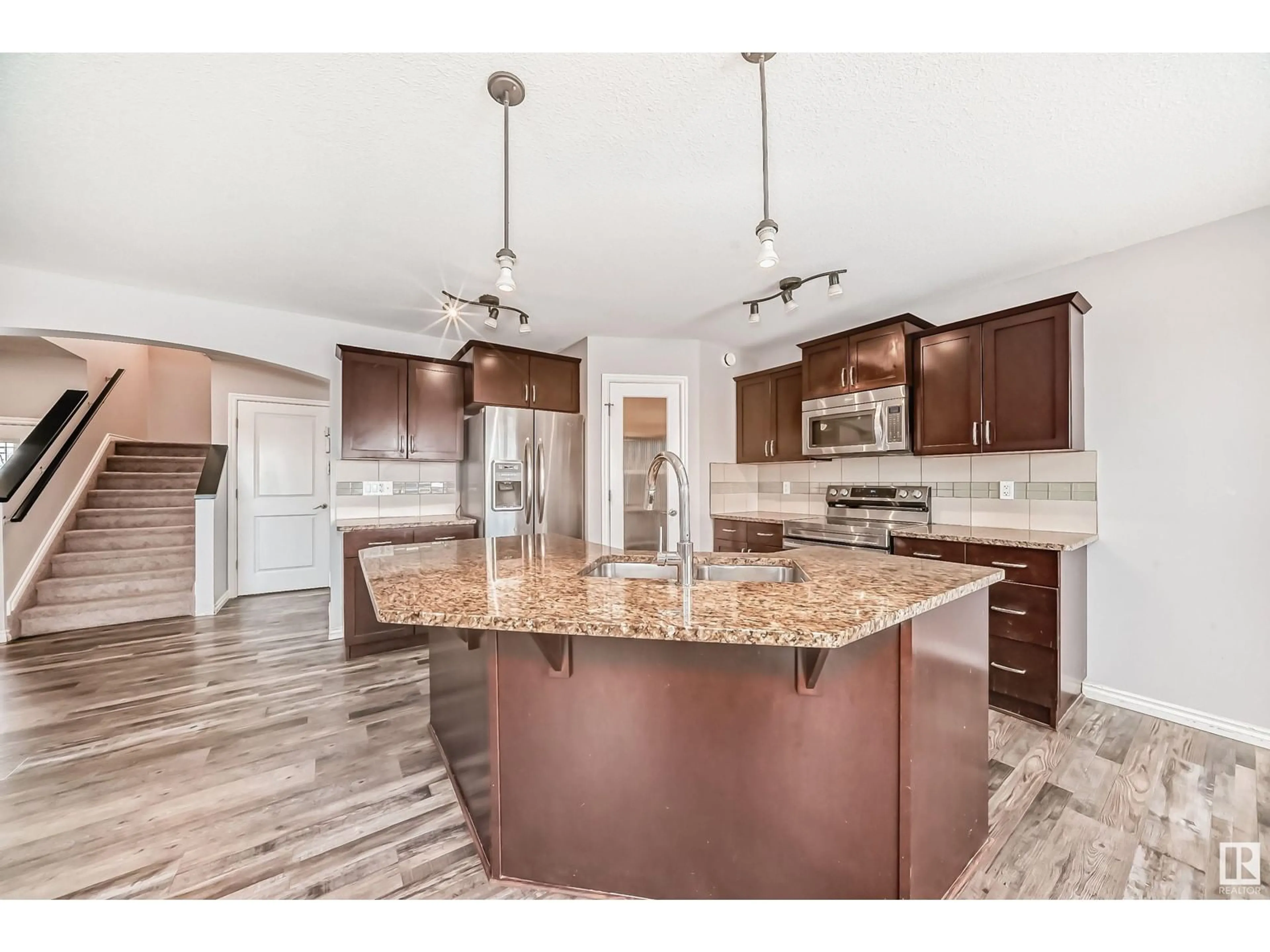 Open concept kitchen, unknown for 62 Selkirk PL, Leduc Alberta T9E0L4