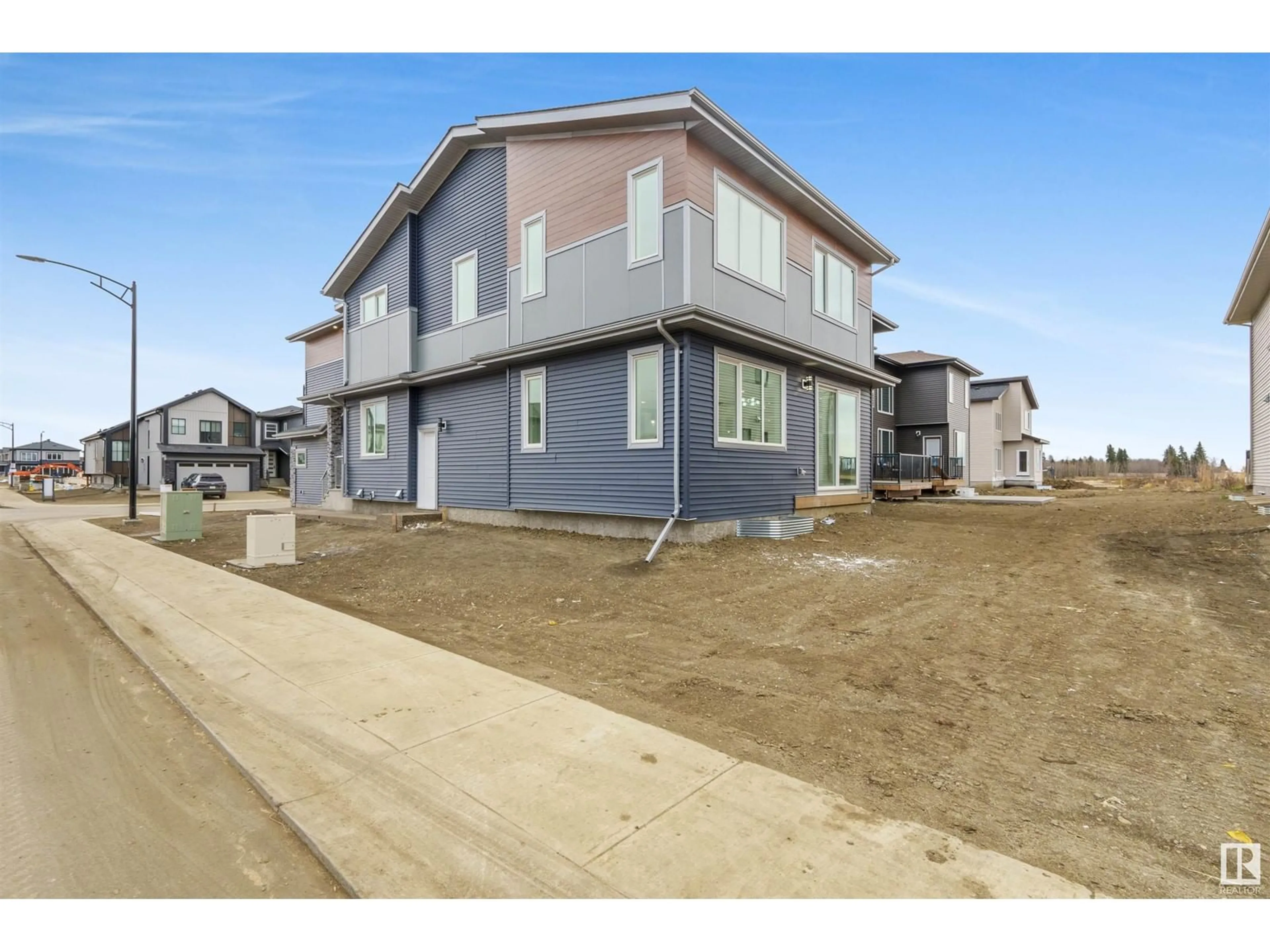 Home with vinyl exterior material, street for 8904 MAYDAY WY SW, Edmonton Alberta T6X3E6