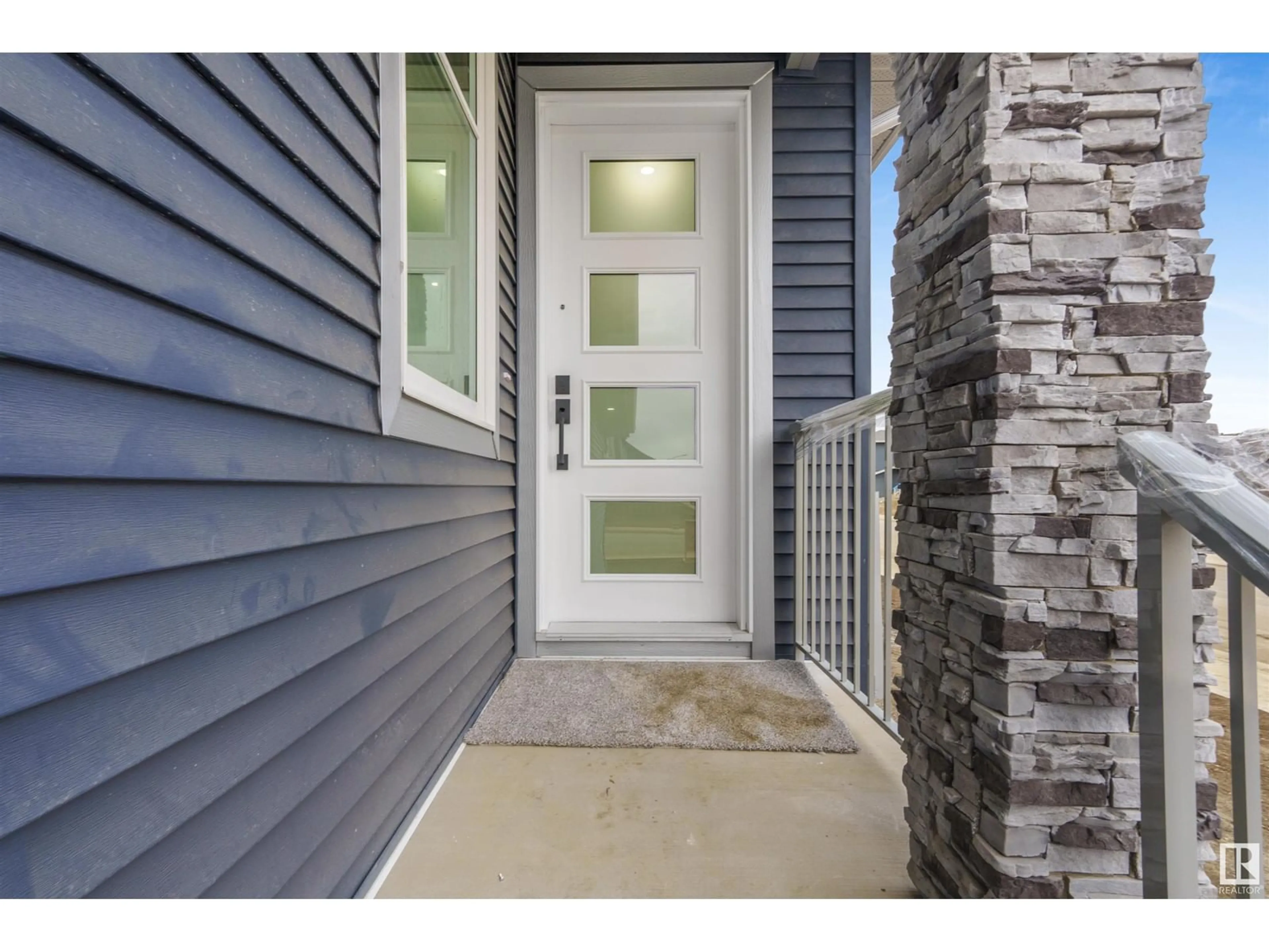 Indoor entryway for 8904 MAYDAY WY SW, Edmonton Alberta T6X3E6