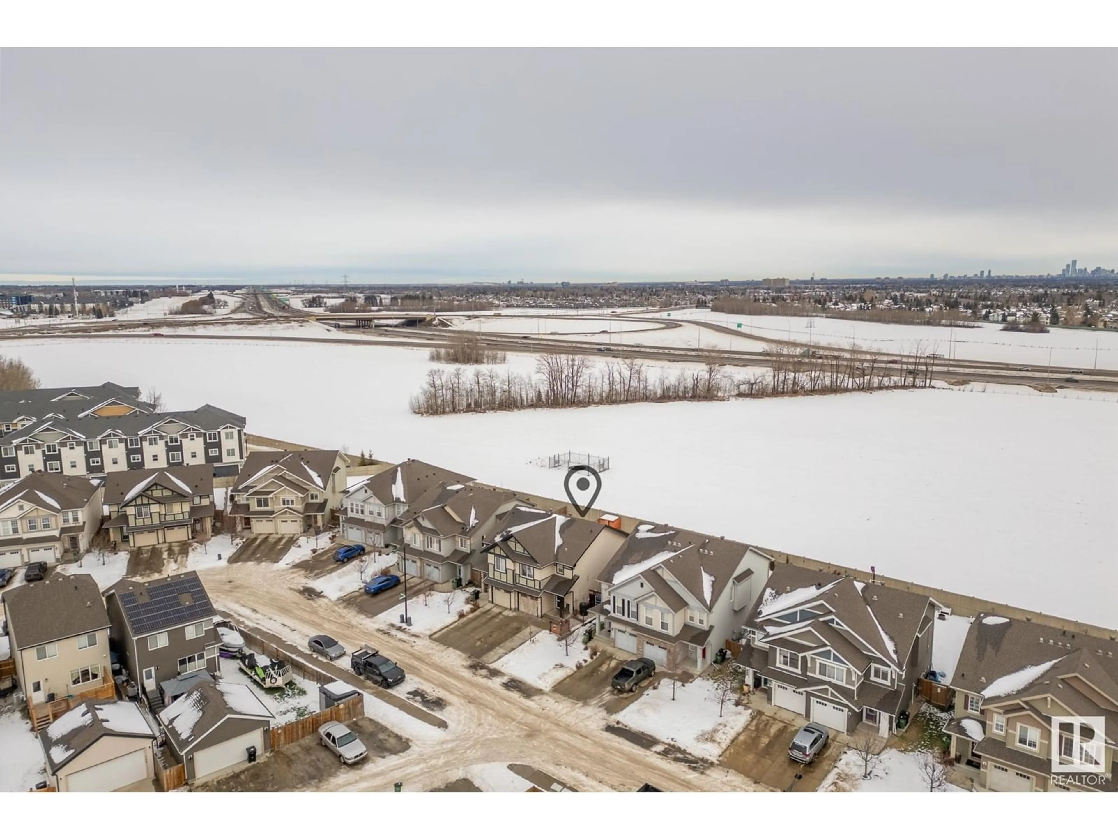 A pic from outside/outdoor area/front of a property/back of a property/a pic from drone, water/lake/river/ocean view for 729 Eagleson Cres NW, Edmonton Alberta T6M0V3