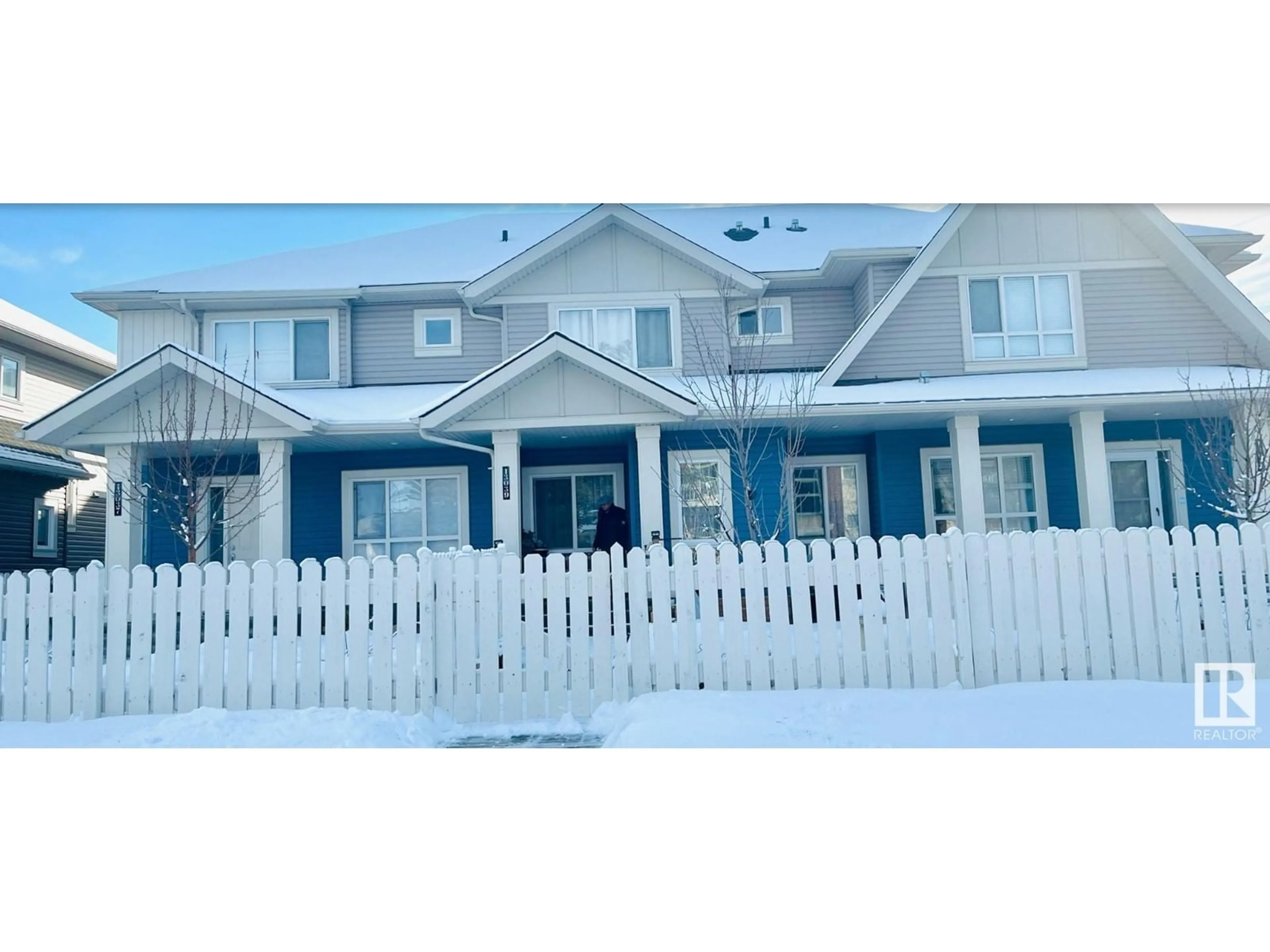 Home with vinyl exterior material, street for 13039 132 Ave NW NW, Edmonton Alberta T5L3R2