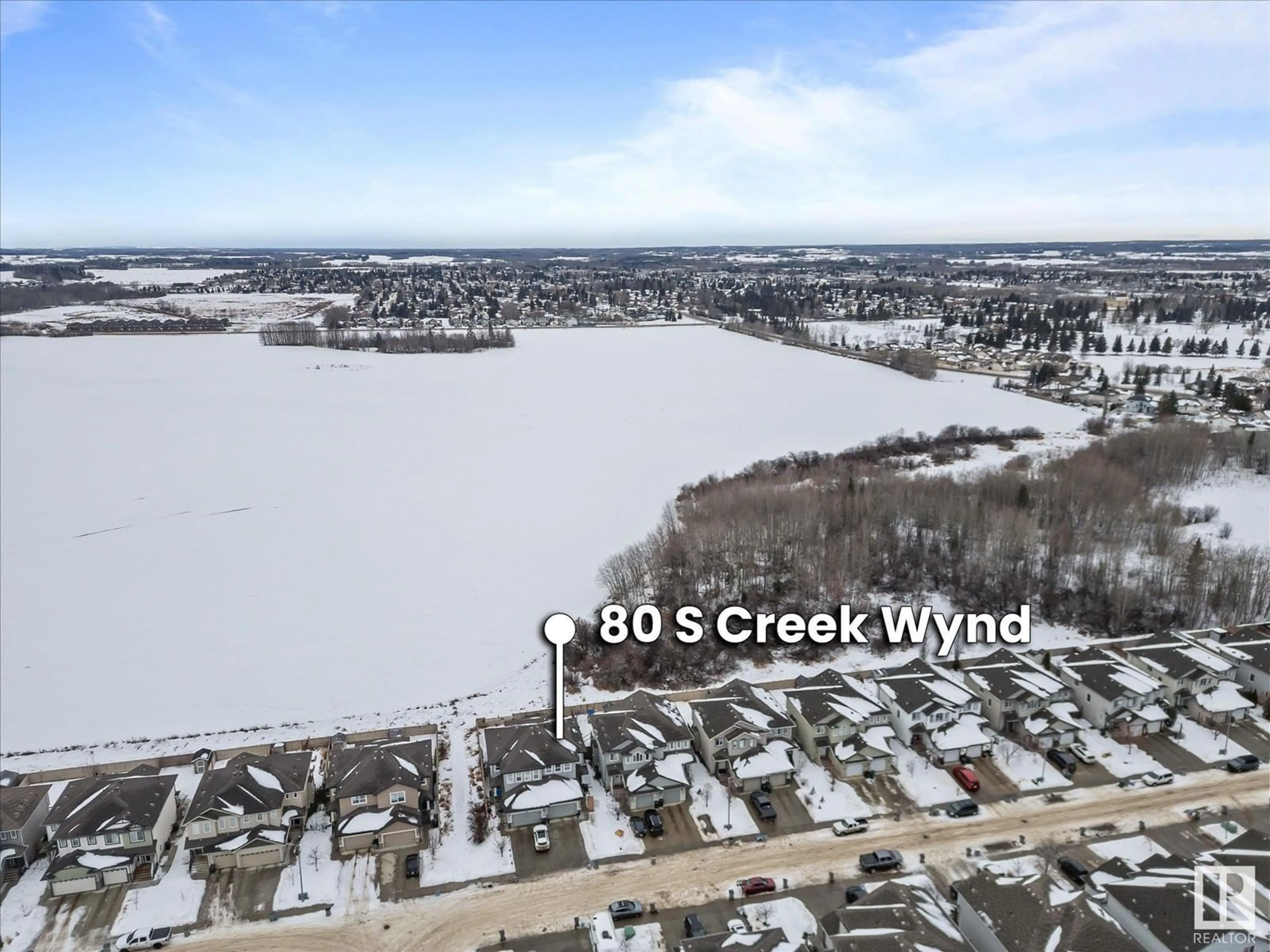 A pic from outside/outdoor area/front of a property/back of a property/a pic from drone, water/lake/river/ocean view for 80 SOUTH CREEK WD, Stony Plain Alberta T7Z0J8