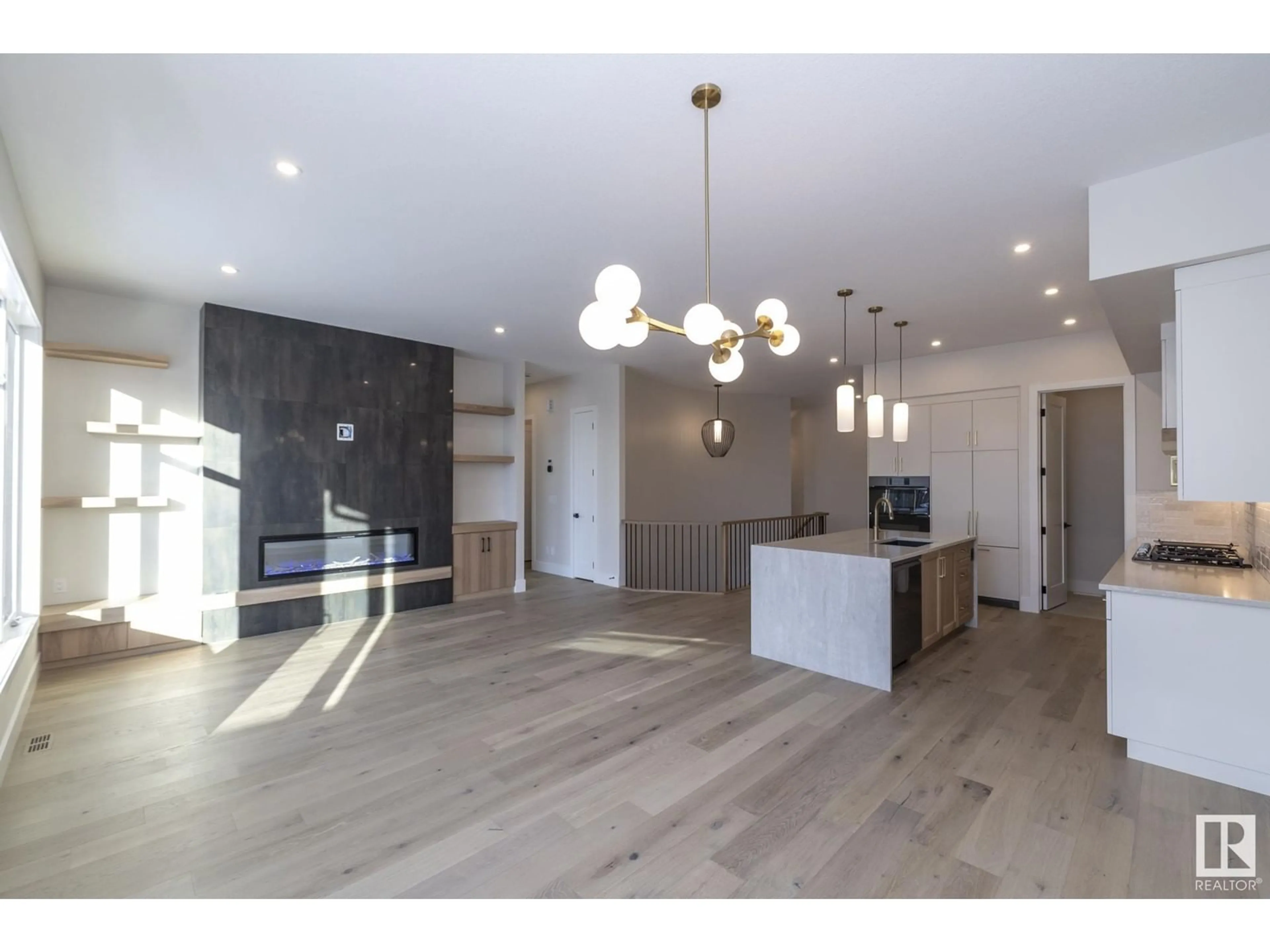 Open concept kitchen, wood/laminate floor for 4621 KNIGHT PT SW, Edmonton Alberta T6W4B7