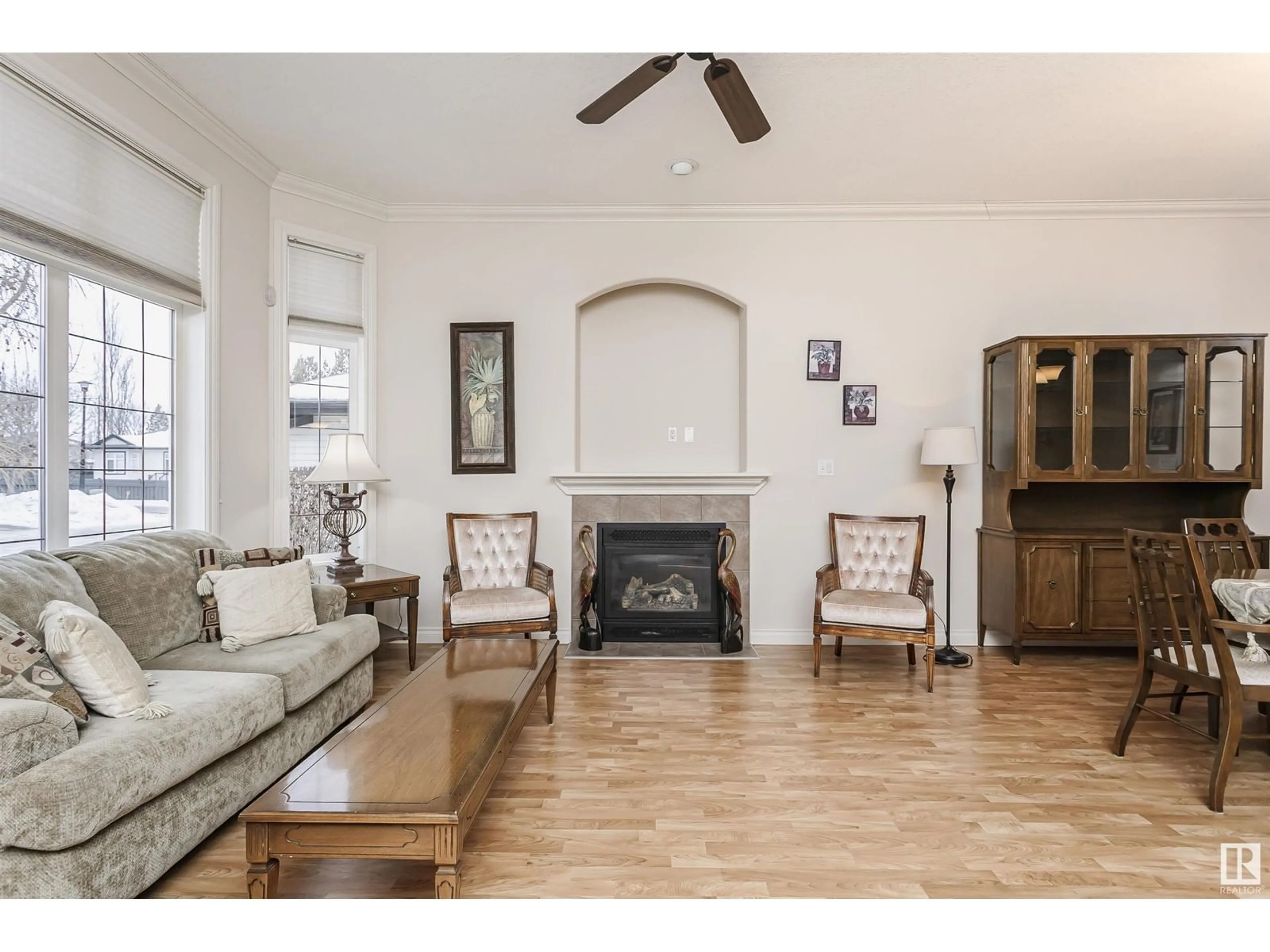 Living room with furniture, wood/laminate floor for #6 12504 15 AV SW, Edmonton Alberta T6W1V2