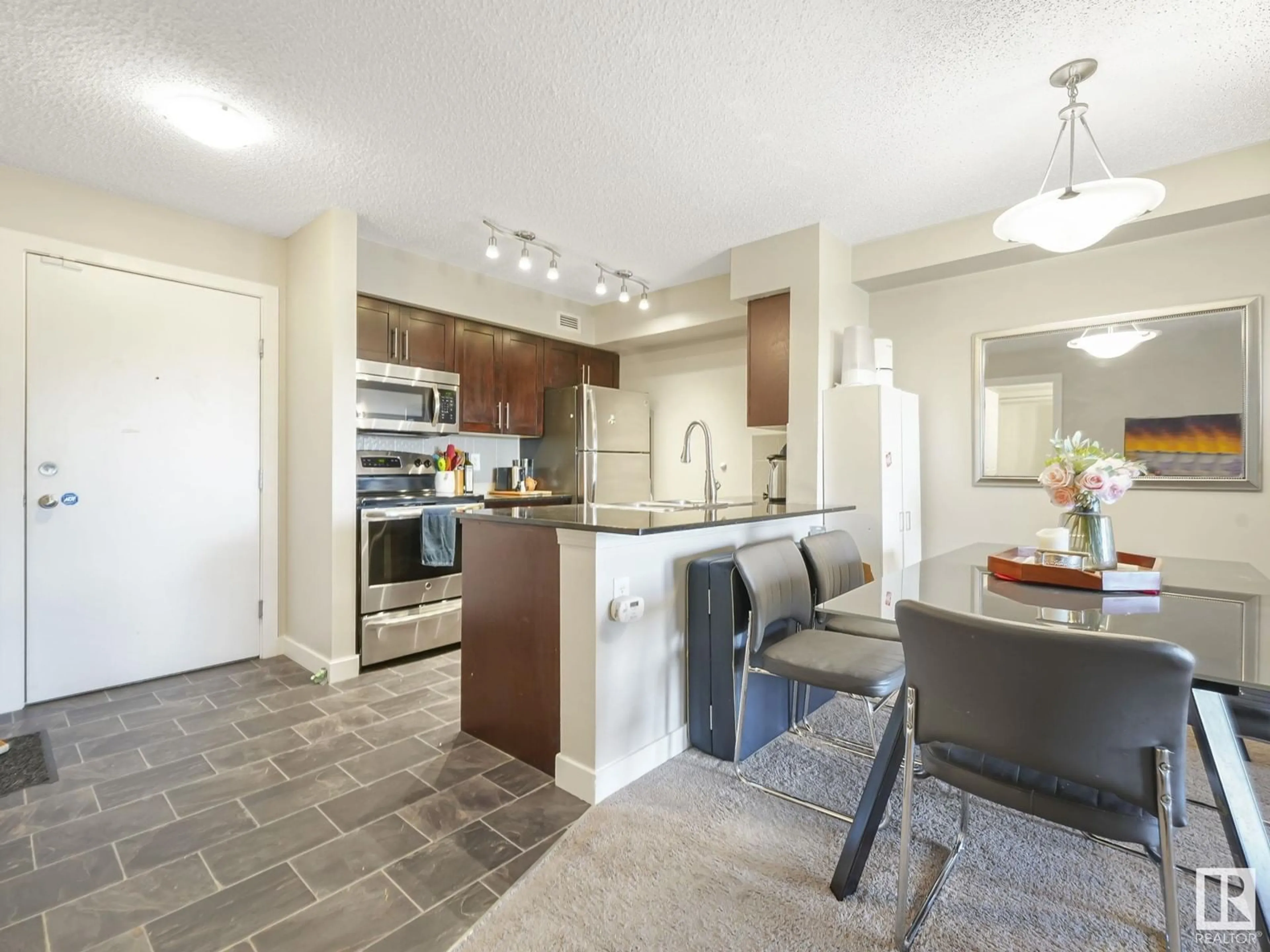 Open concept kitchen, ceramic/tile floor for #404 270 MCCONACHIE DR NW, Edmonton Alberta T5Y3N4