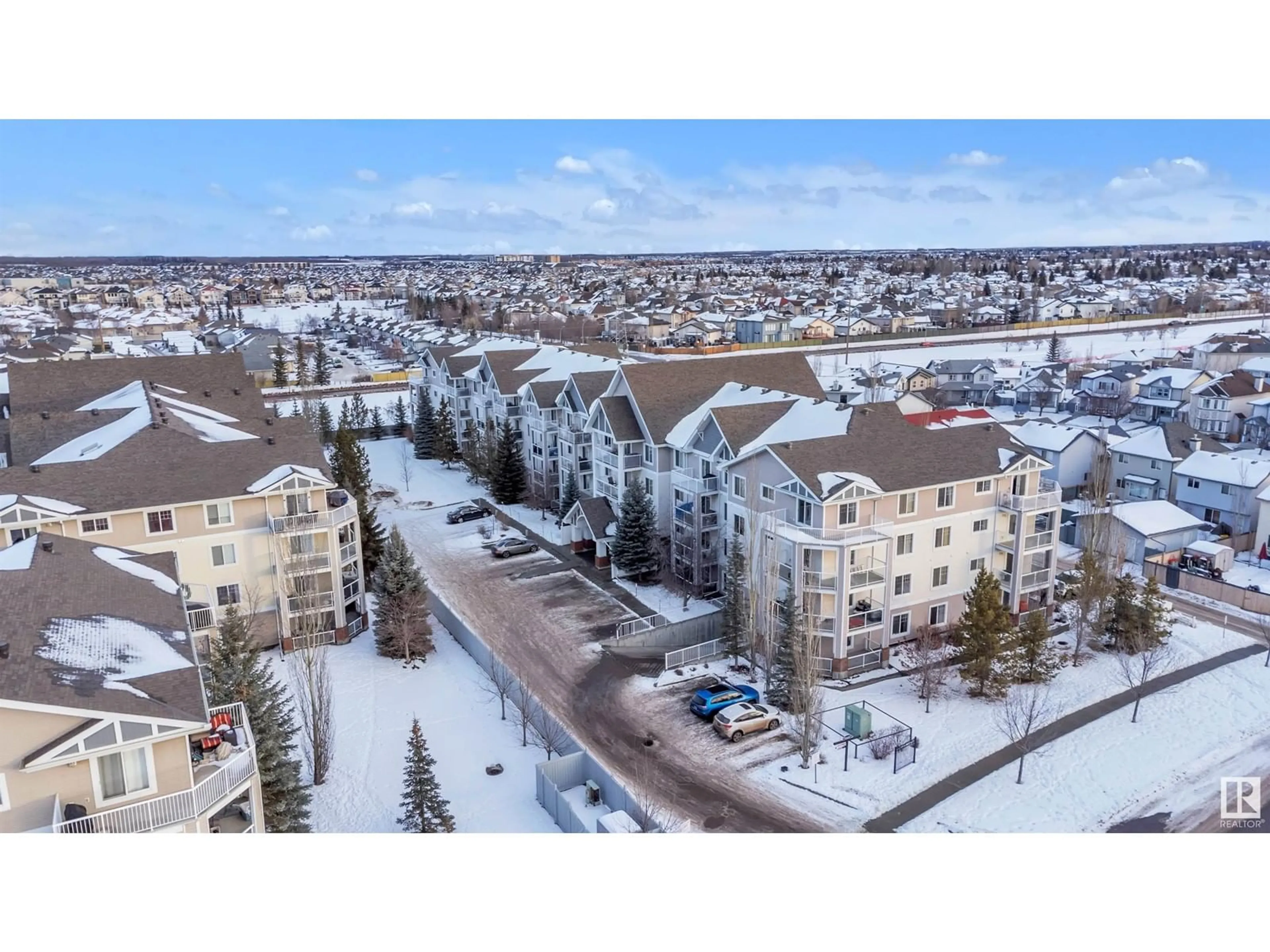 A pic from outside/outdoor area/front of a property/back of a property/a pic from drone, city buildings view from balcony for #102 13710 150 AV NW, Edmonton Alberta T6V0B2