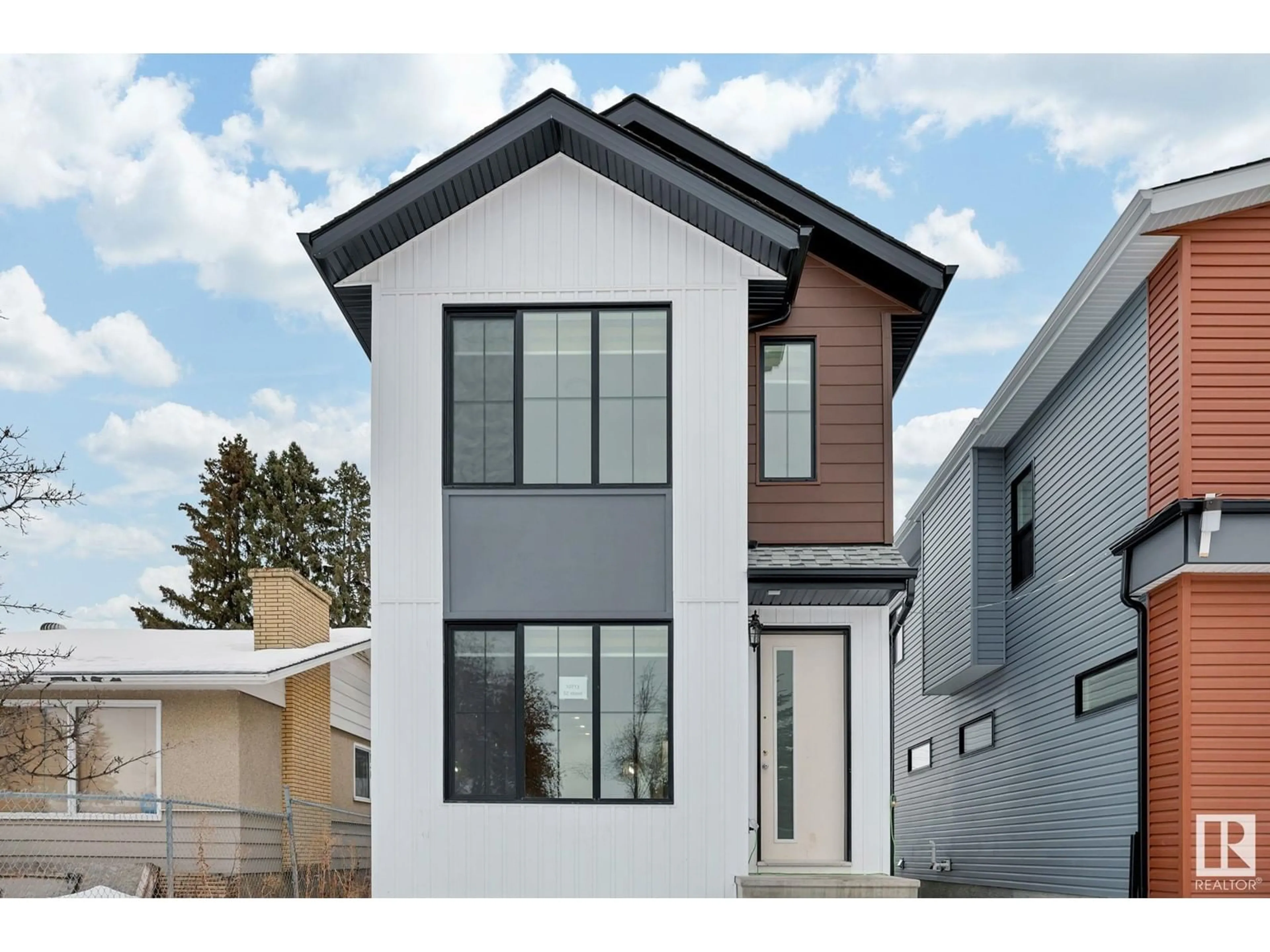 Home with vinyl exterior material, street for 10713 52 ST NW NW, Edmonton Alberta T6H2H2