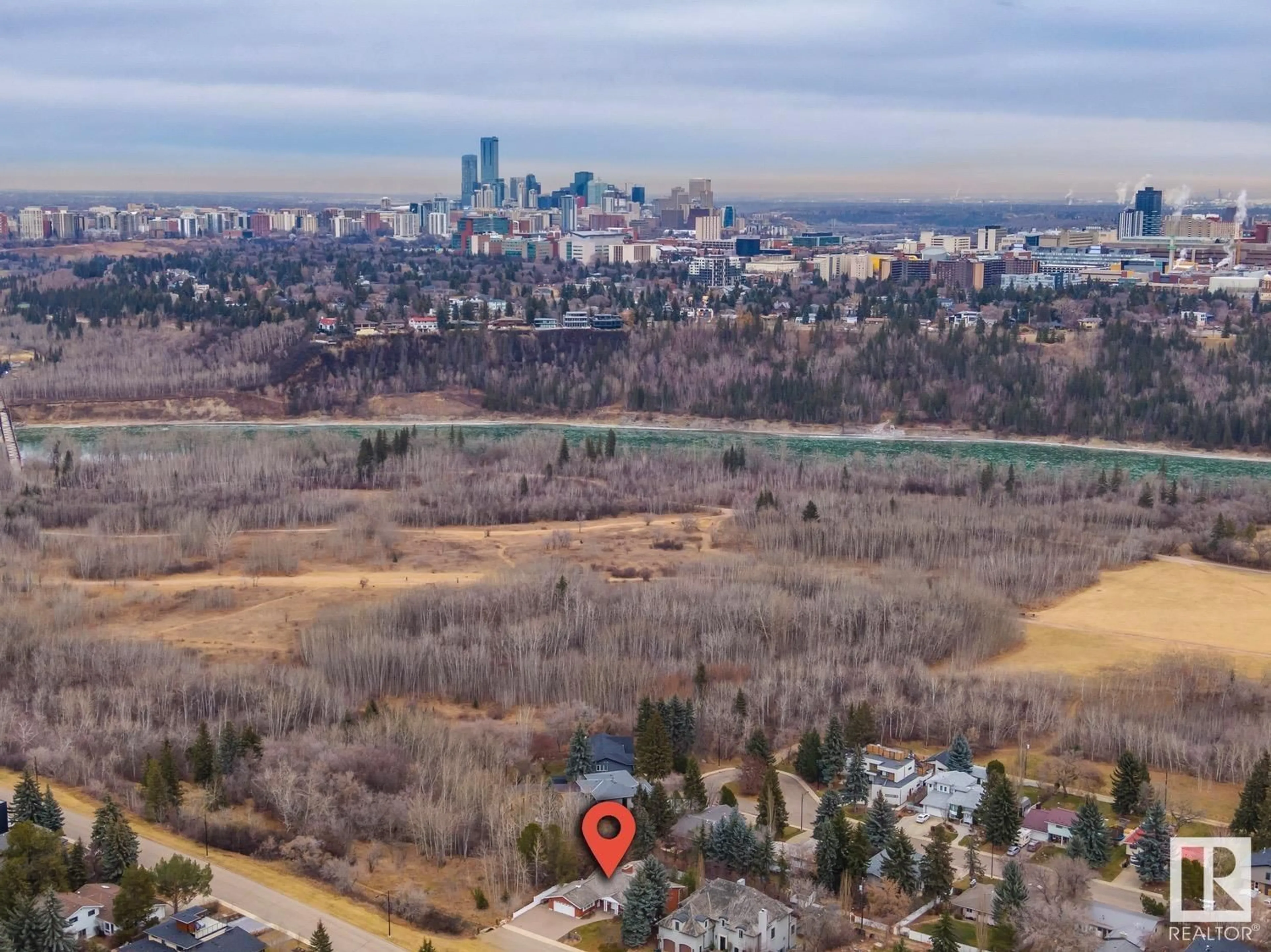 A pic from outside/outdoor area/front of a property/back of a property/a pic from drone, mountain view for 8303 134 ST NW, Edmonton Alberta T5R0B2