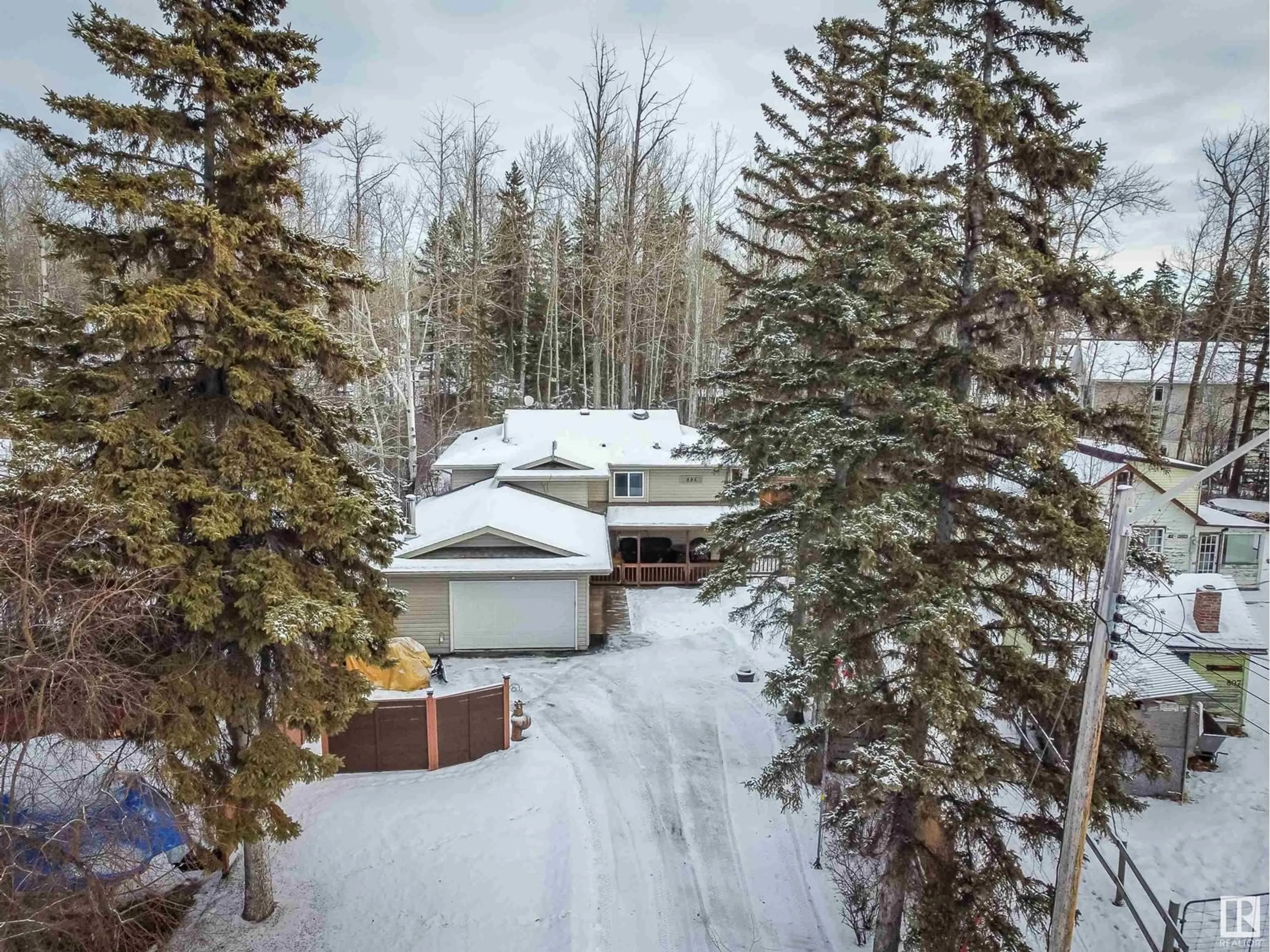 A pic from outside/outdoor area/front of a property/back of a property/a pic from drone, forest/trees view for 806 8 ST, Rural Lac Ste. Anne County Alberta T0E1A0