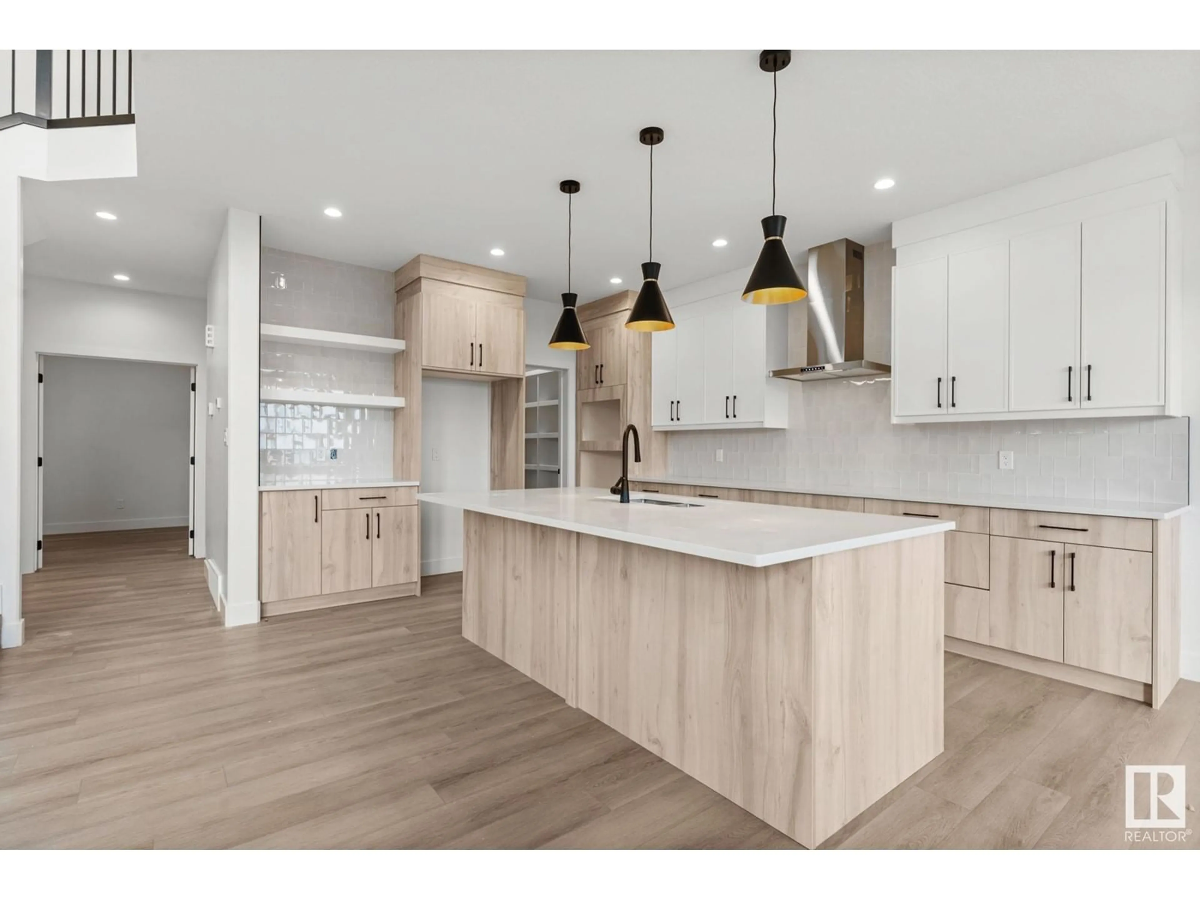 Open concept kitchen, wood/laminate floor for 179 Caledon CR, Spruce Grove Alberta T7X0Y8