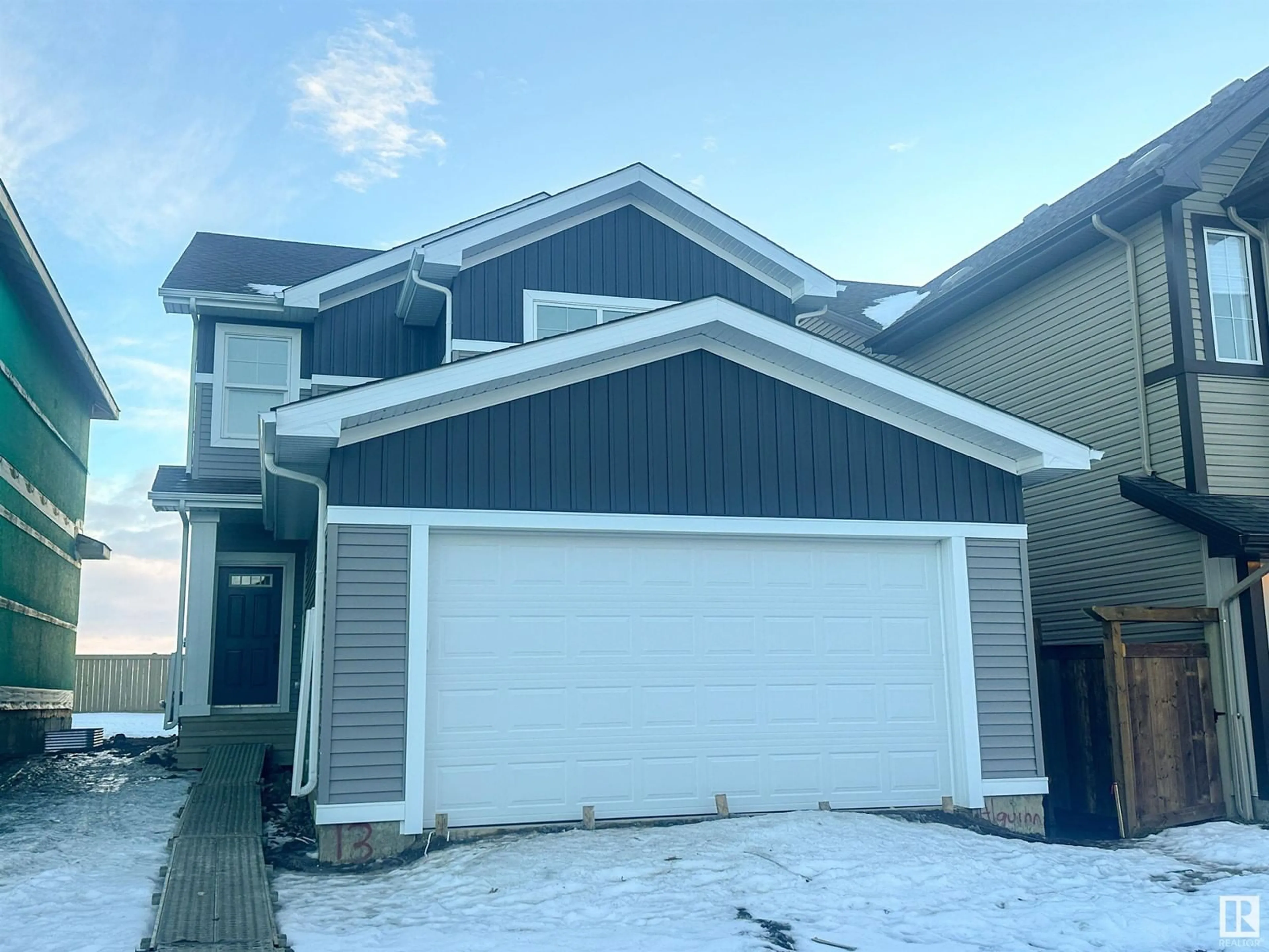 Home with vinyl exterior material, street for 13 SPRINGBROOK WD, Spruce Grove Alberta T7X0E7