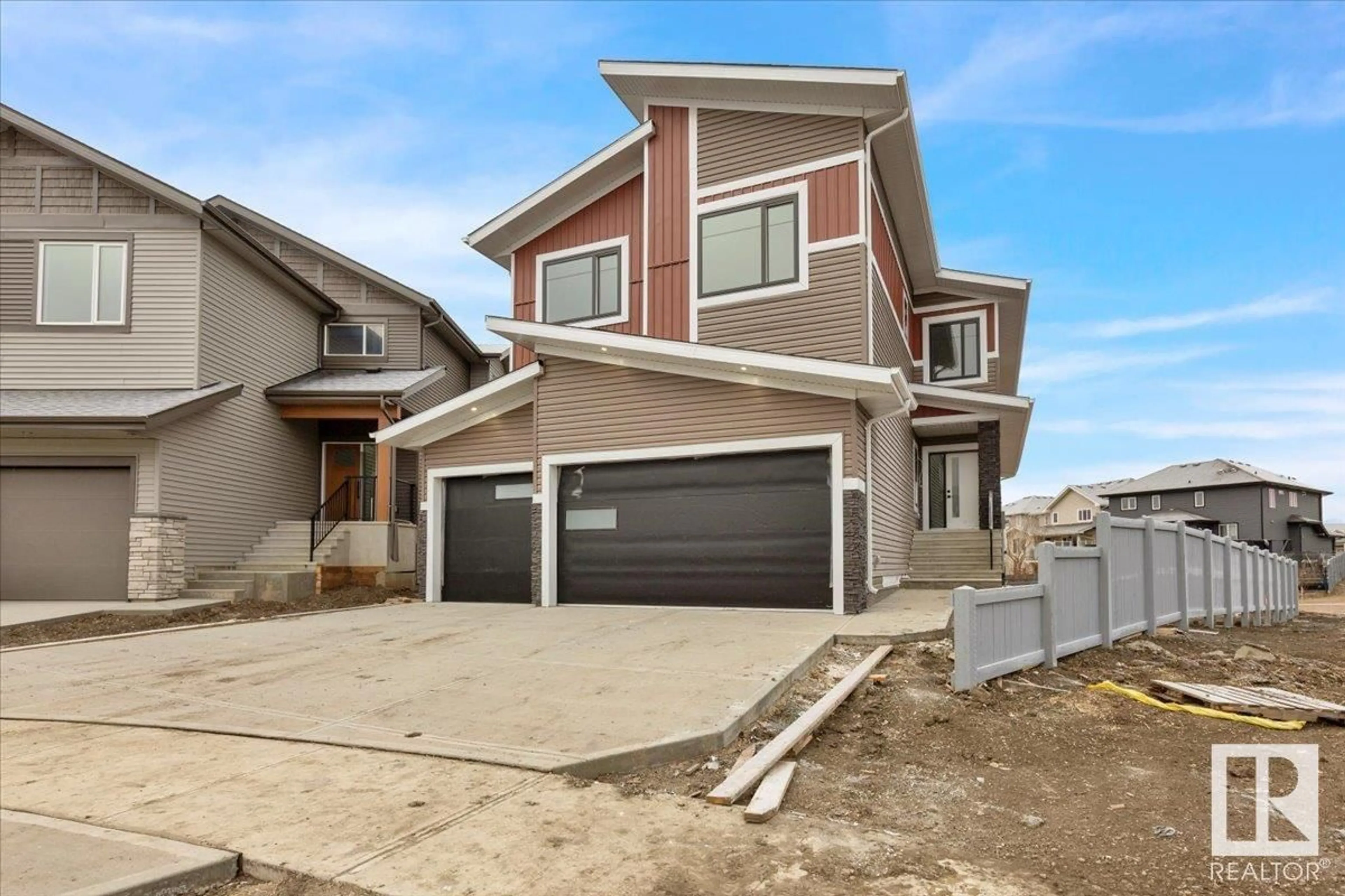 Home with vinyl exterior material, street for 80 DEER MEADOW CR, Fort Saskatchewan Alberta T8L1Y4