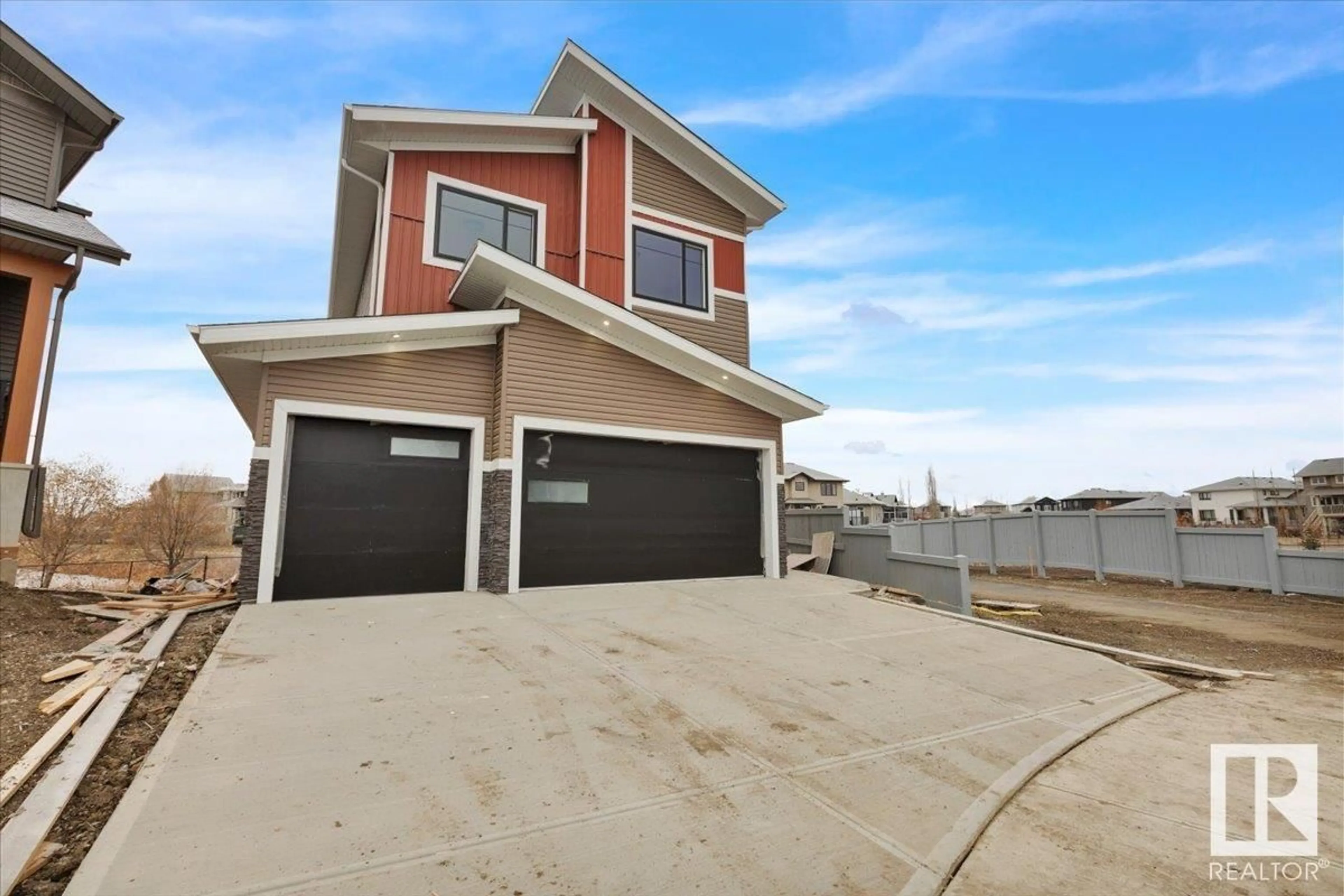 Home with vinyl exterior material, street for 80 DEER MEADOW CR, Fort Saskatchewan Alberta T8L1Y4