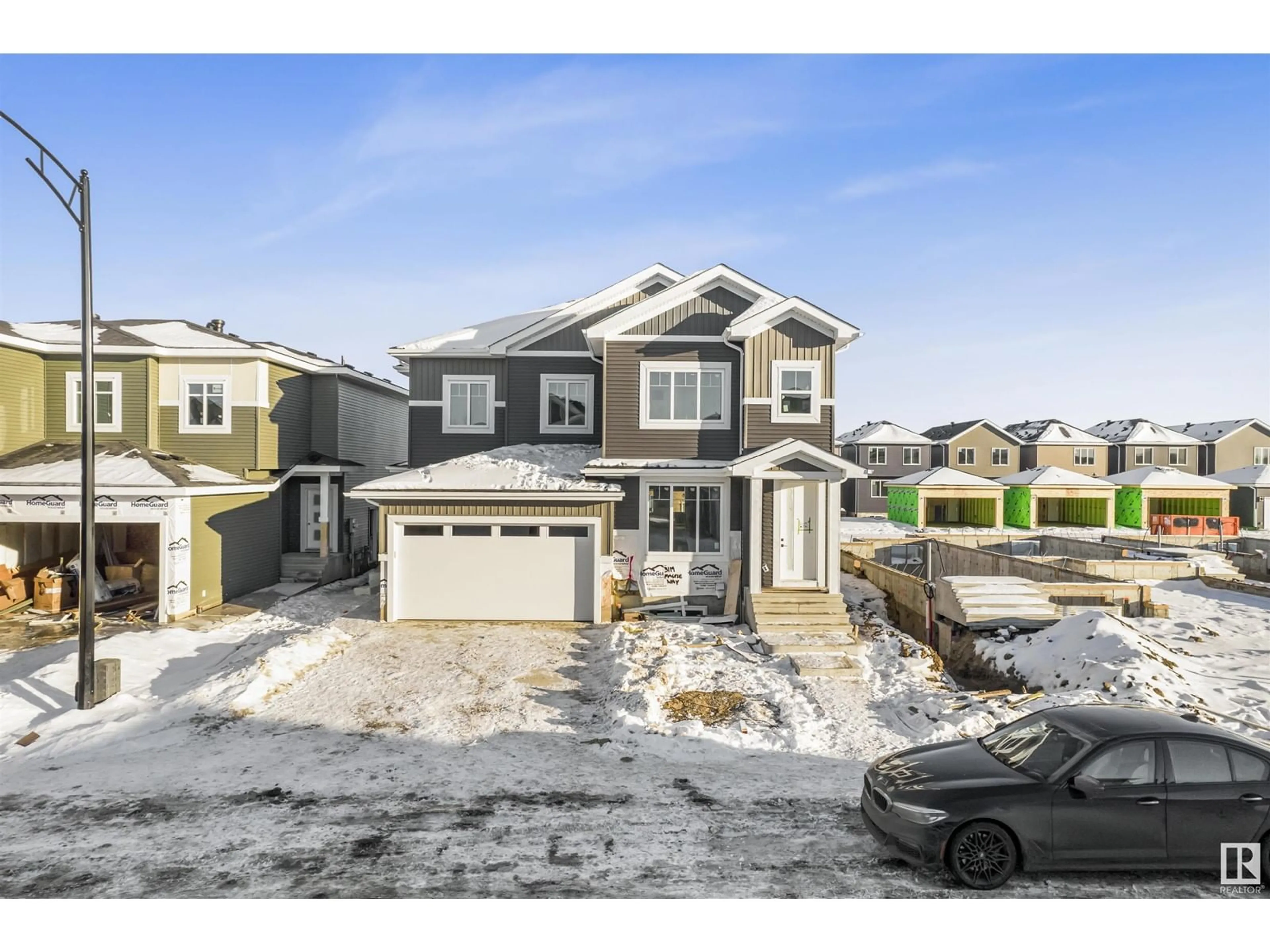 A pic from outside/outdoor area/front of a property/back of a property/a pic from drone, street for 3129 Magpie WY NW, Edmonton Alberta T5S0A0