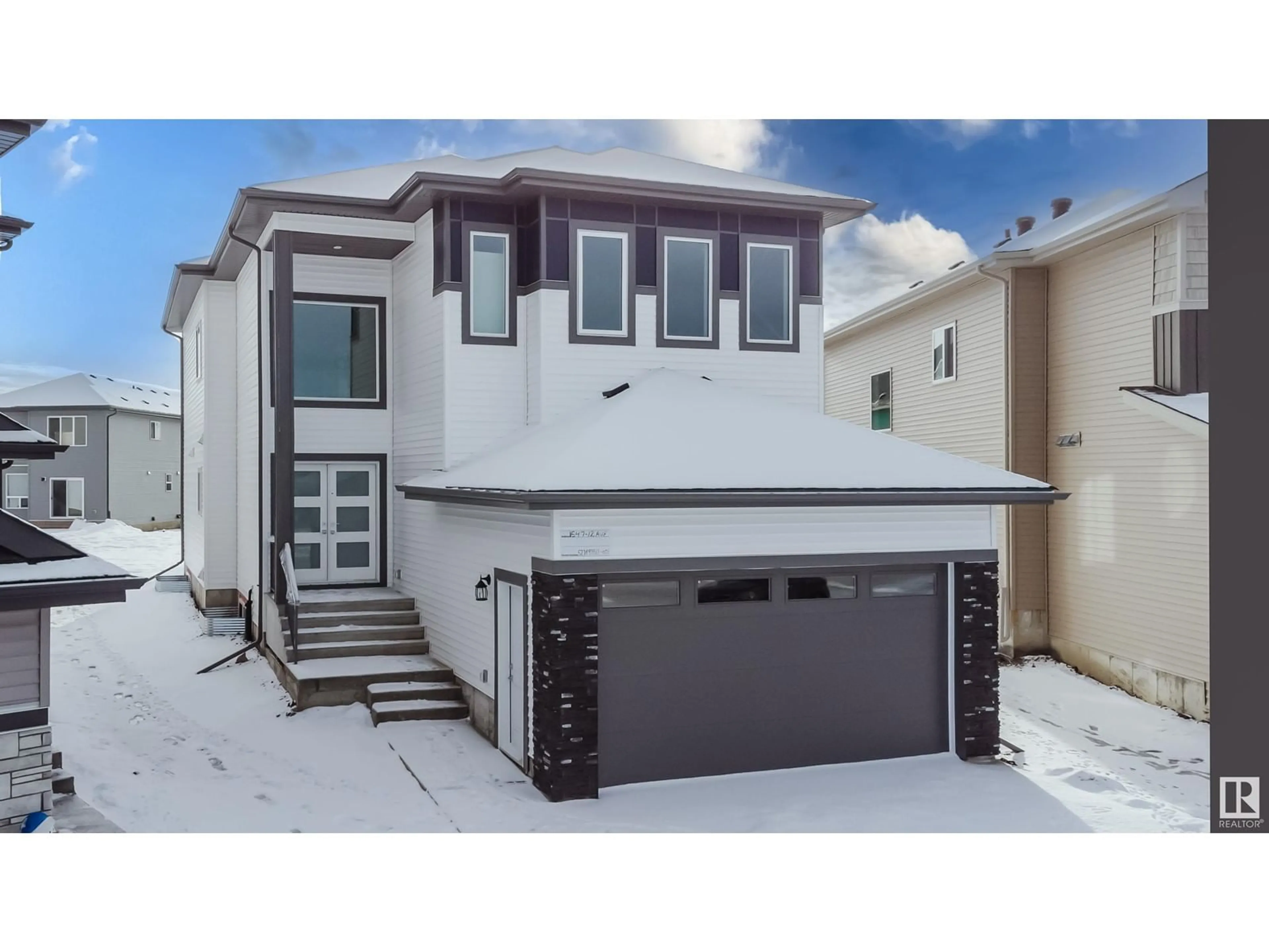 Home with vinyl exterior material, street for 1547 12 AV NW, Edmonton Alberta T6T2S6