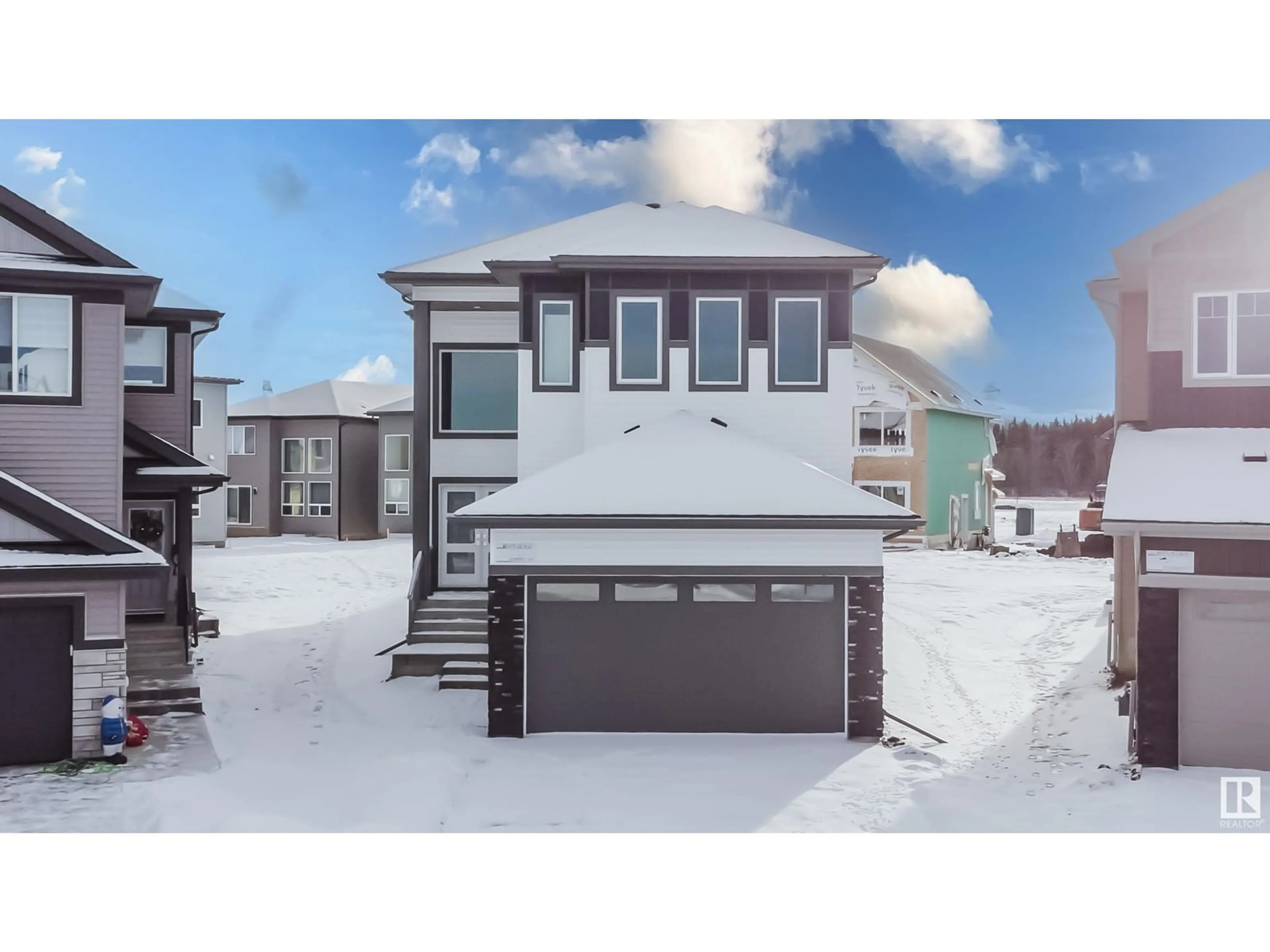 Home with vinyl exterior material, street for 1547 12 AV NW, Edmonton Alberta T6T2S6