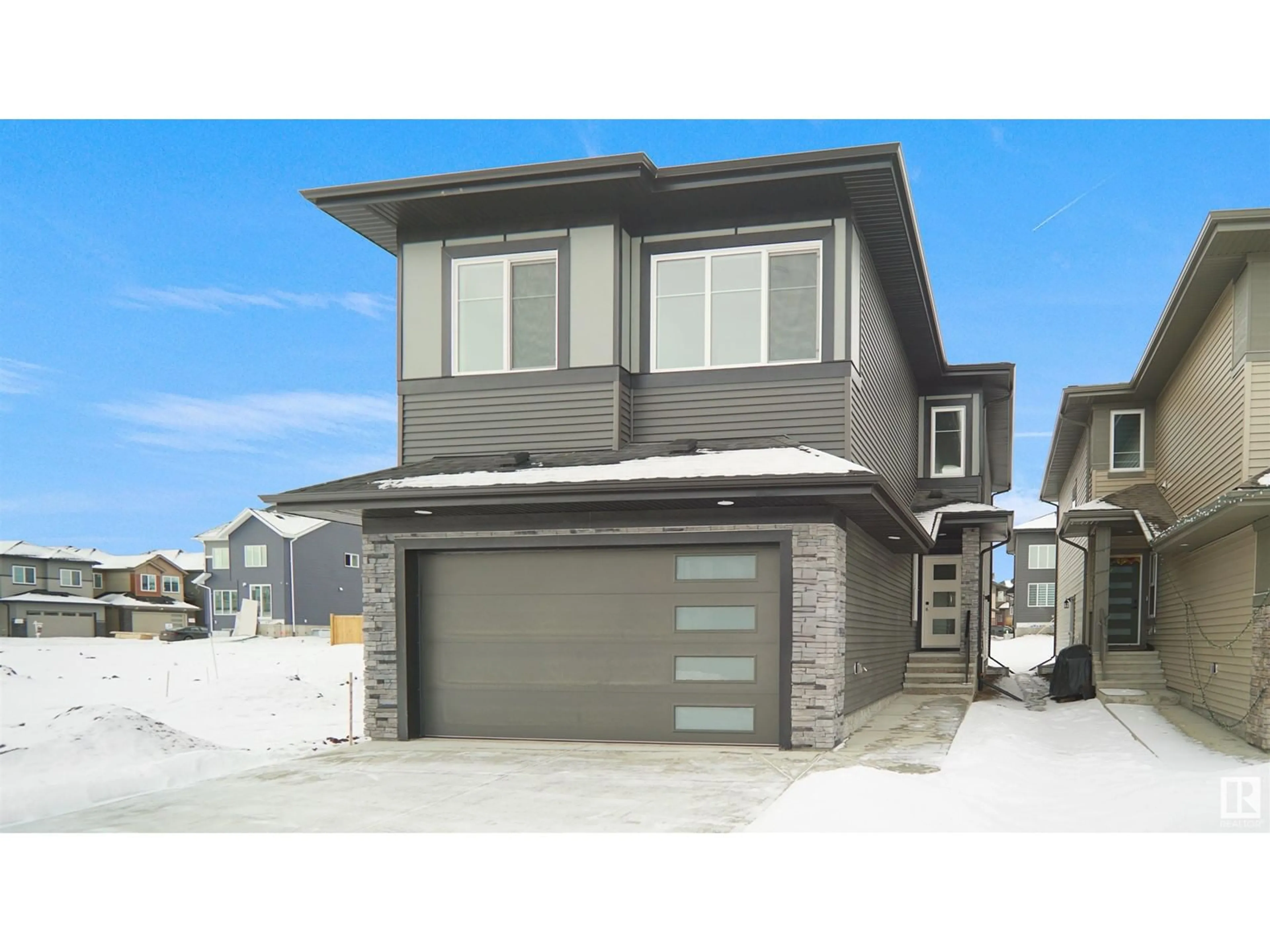 Home with vinyl exterior material, street for 16904 47 ST NW, Edmonton Alberta T5Y0W3