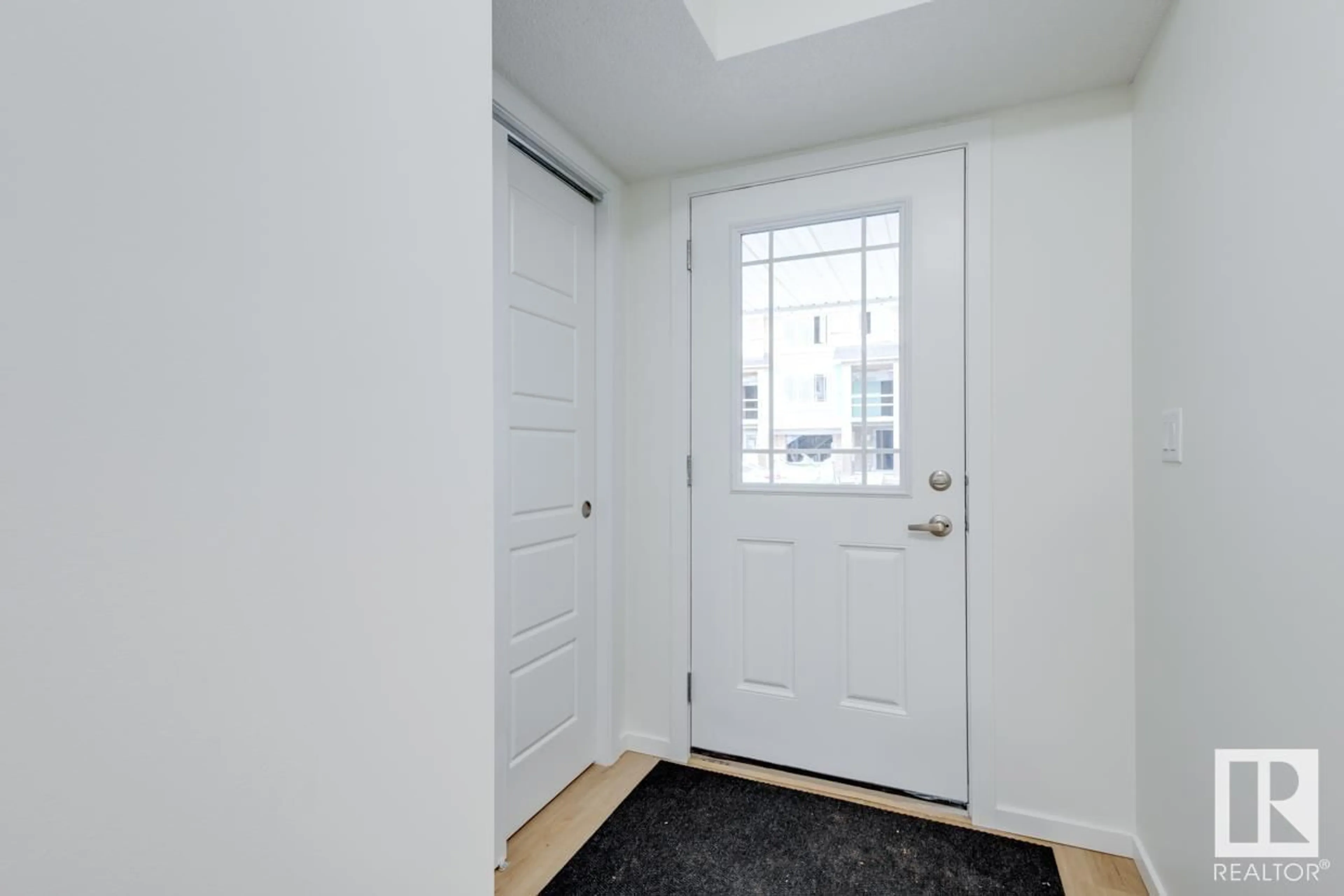 Indoor entryway for 20625 21A AV NW, Edmonton Alberta T6M1N3