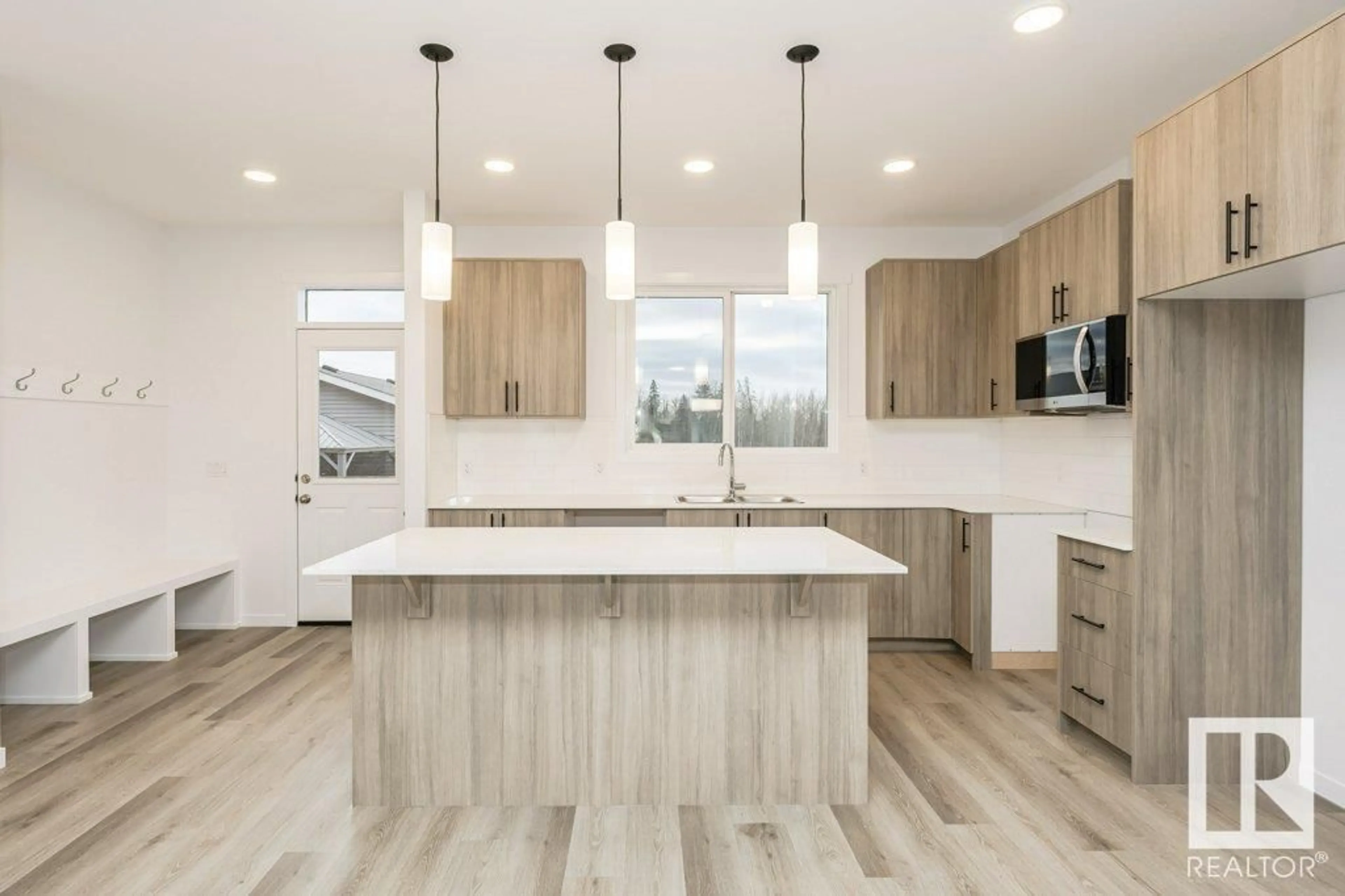 Open concept kitchen, unknown for 2431 TRUMPETER WY NW, Edmonton Alberta T5S0S9