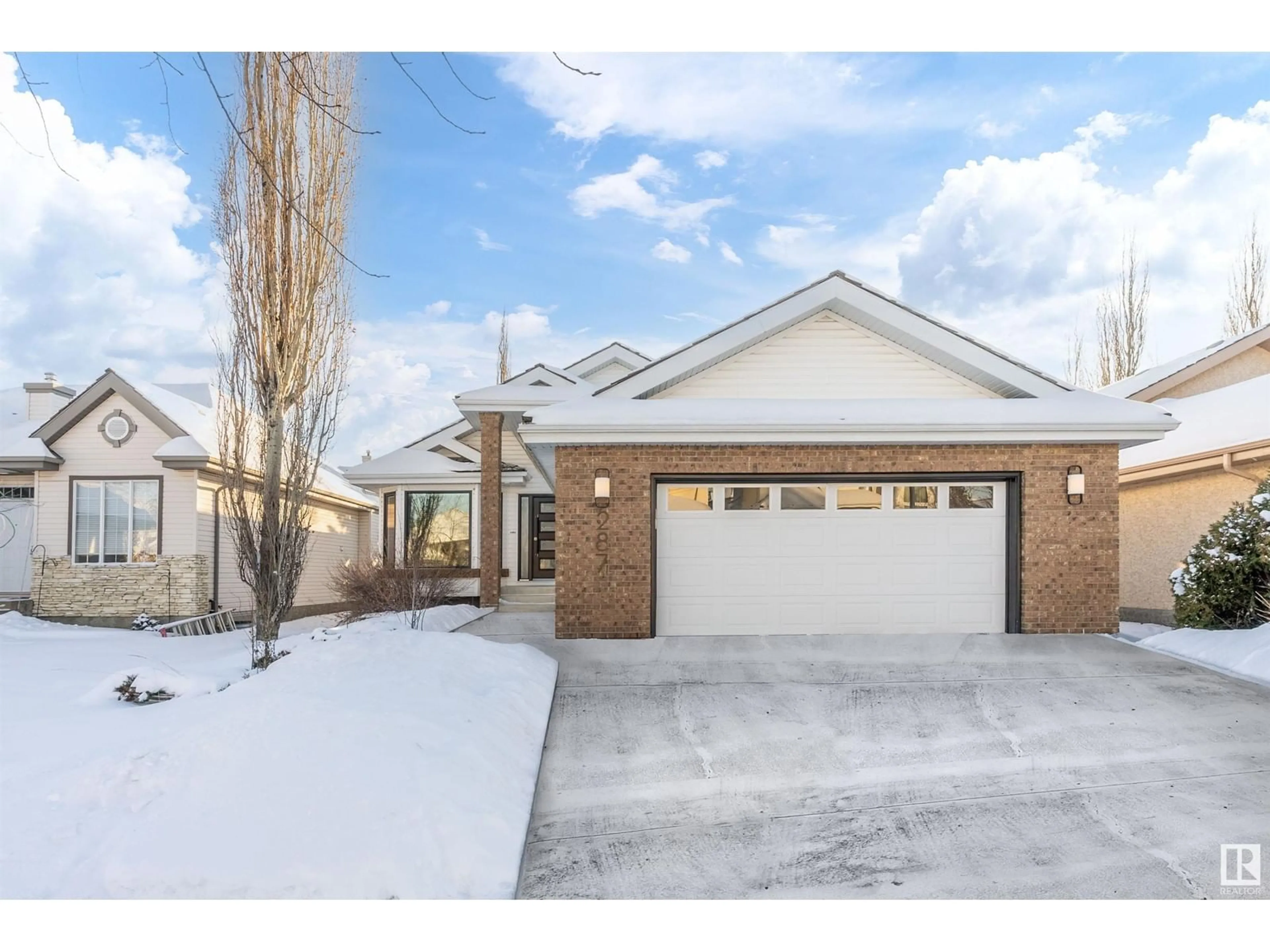 Home with brick exterior material, street for 287 DARLINGTON CR NW, Edmonton Alberta T6M2R9