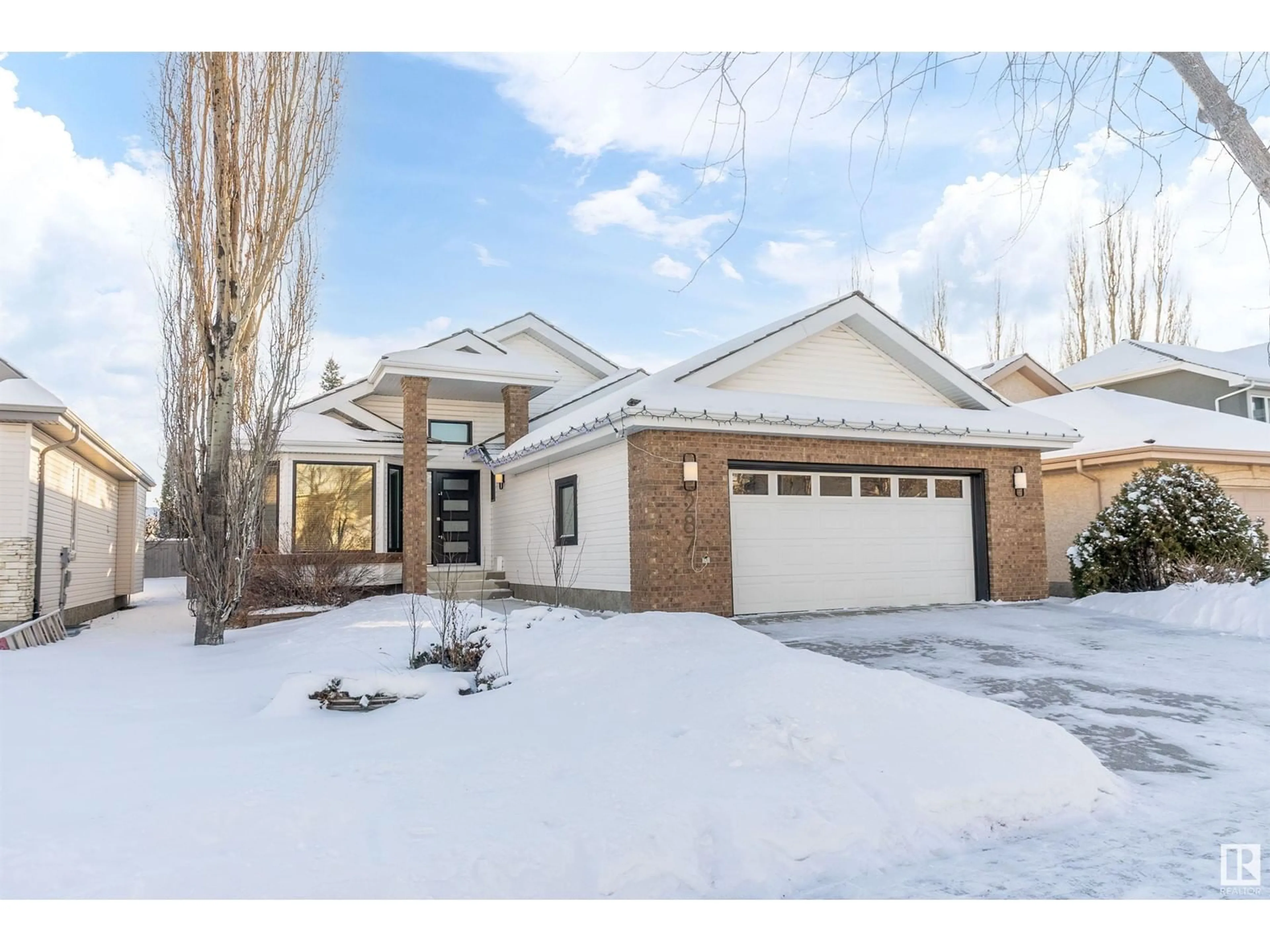 Home with brick exterior material, street for 287 DARLINGTON CR NW, Edmonton Alberta T6M2R9