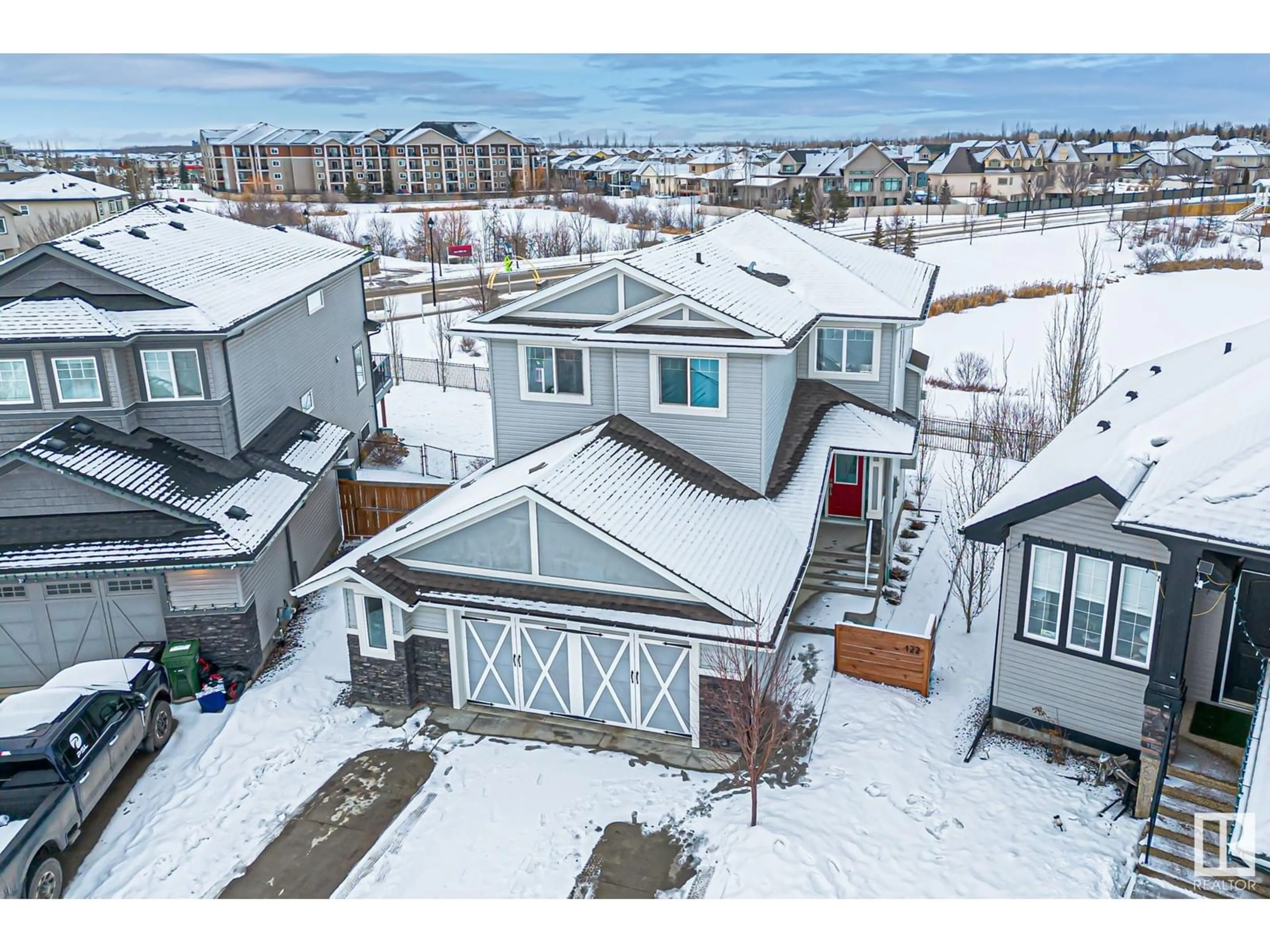 A pic from outside/outdoor area/front of a property/back of a property/a pic from drone, mountain view for 122 KIRPATRICK CR, Leduc Alberta T9E0W2