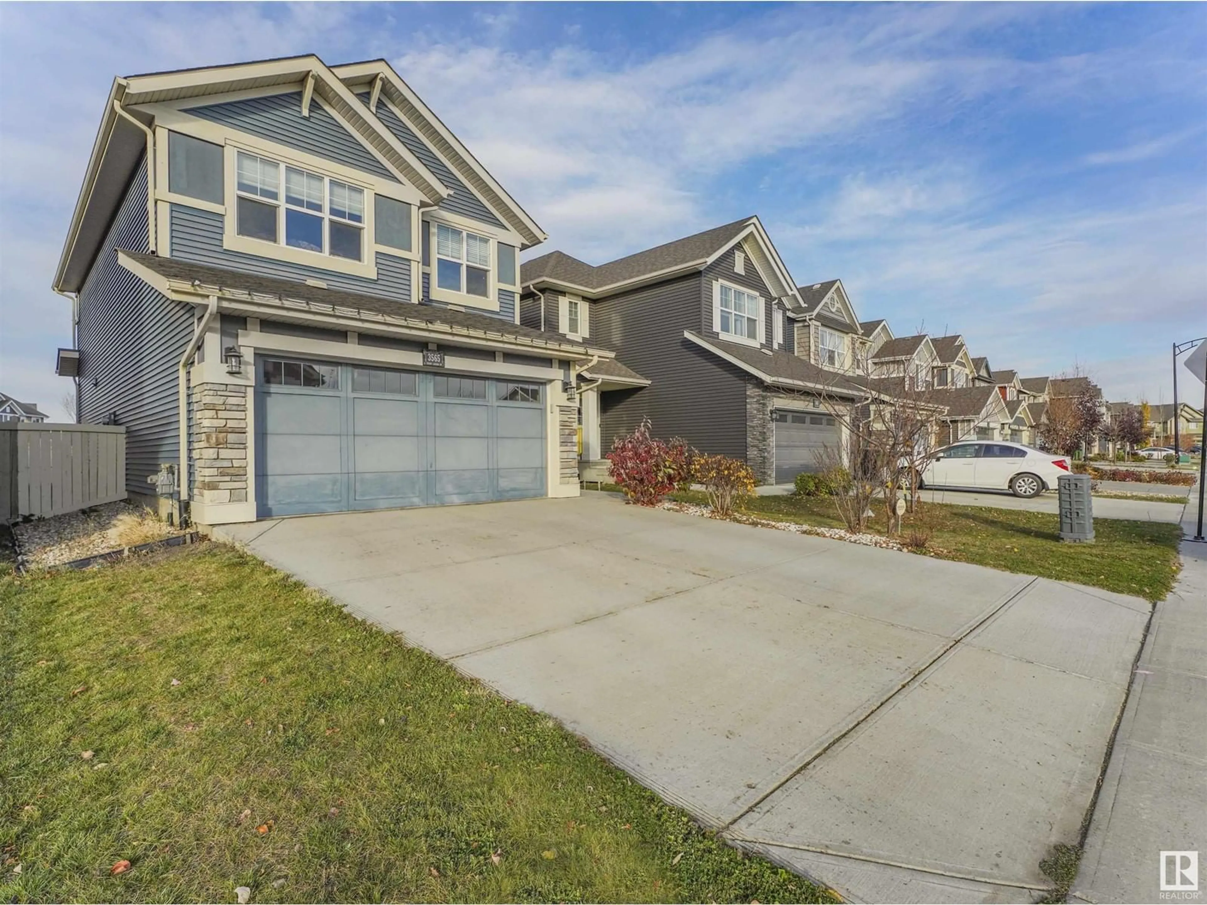 Home with vinyl exterior material, street for 3565 CHERRY LANDING LD SW, Edmonton Alberta T6X2B5