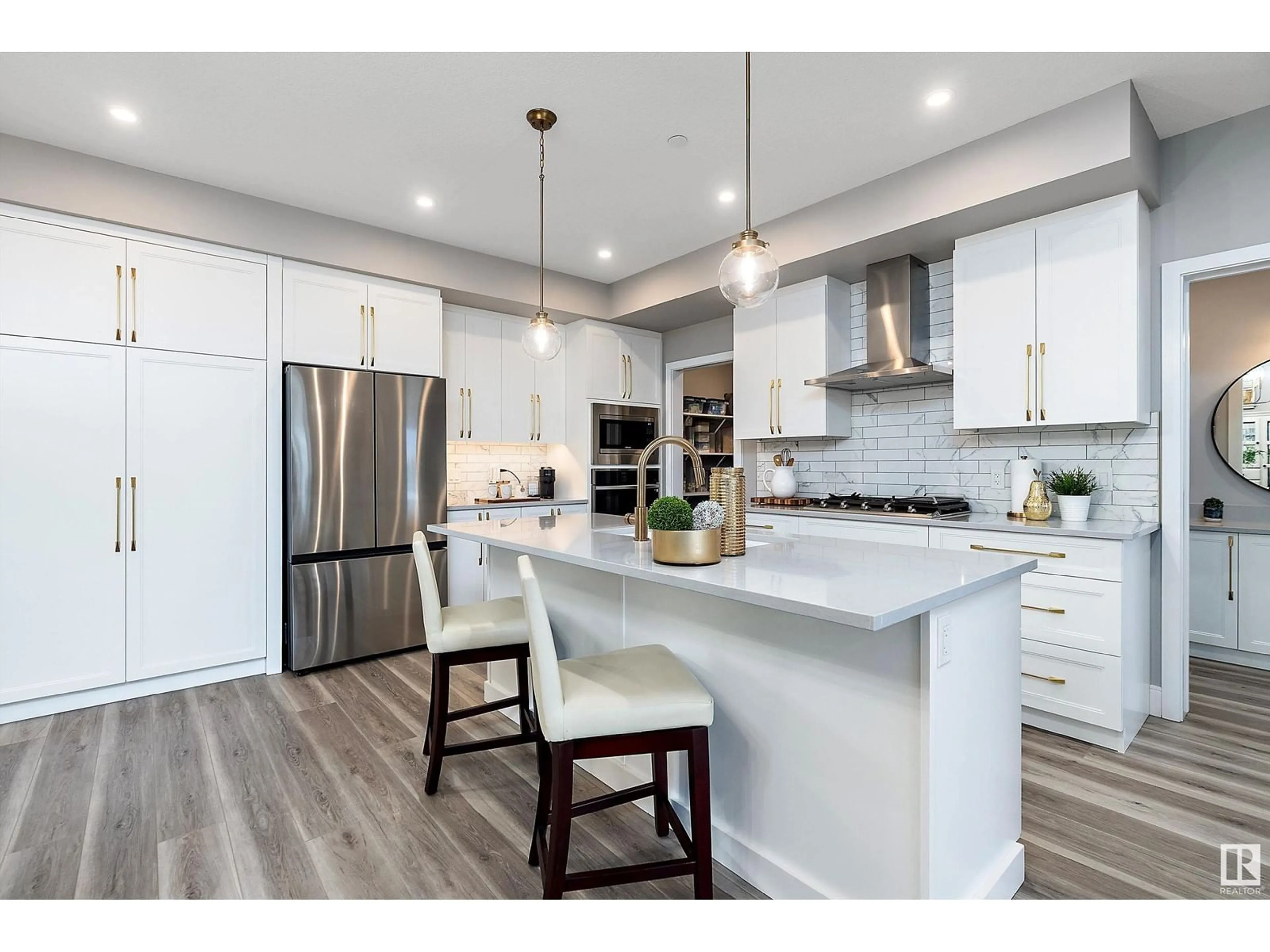 Open concept kitchen, wood/laminate floor for #315 7471 MAY CM NW, Edmonton Alberta T6R0X5