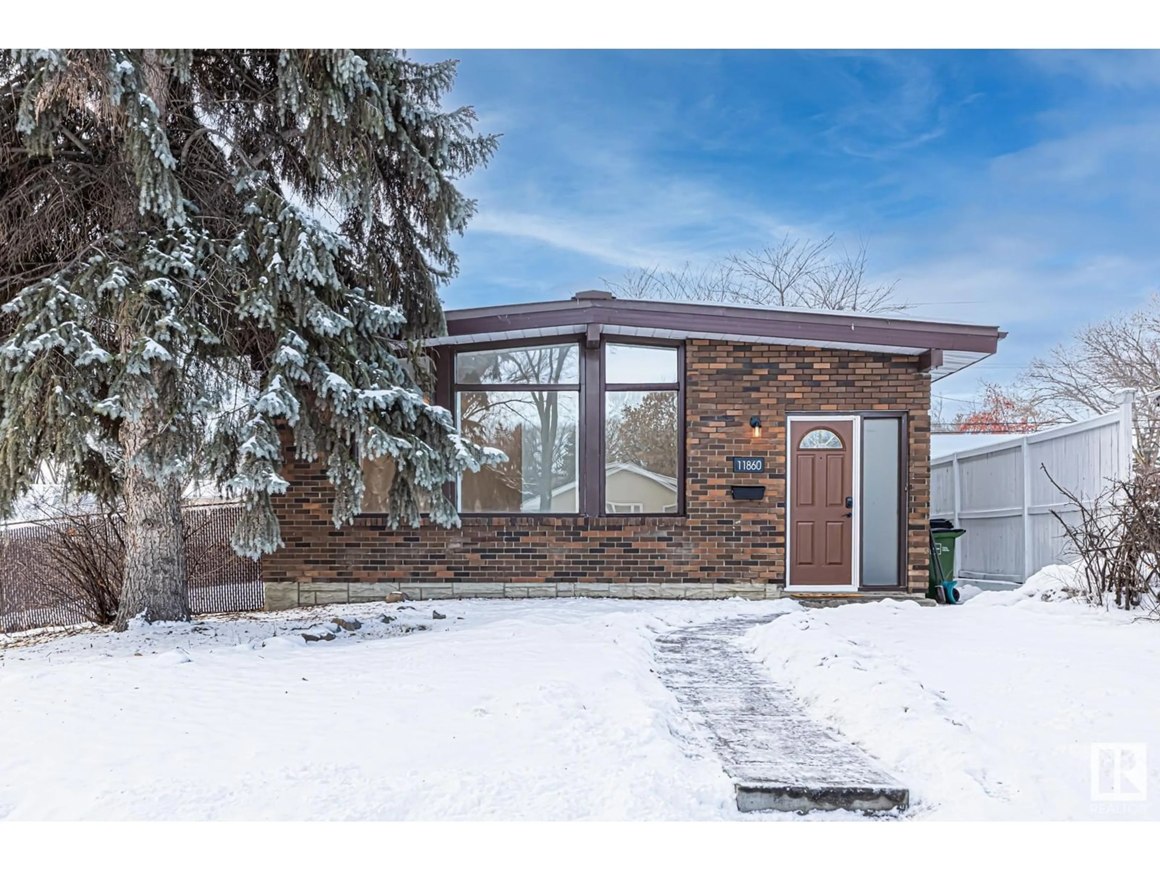 Home with brick exterior material, street for 11860 58 ST NW, Edmonton Alberta T5W3W7