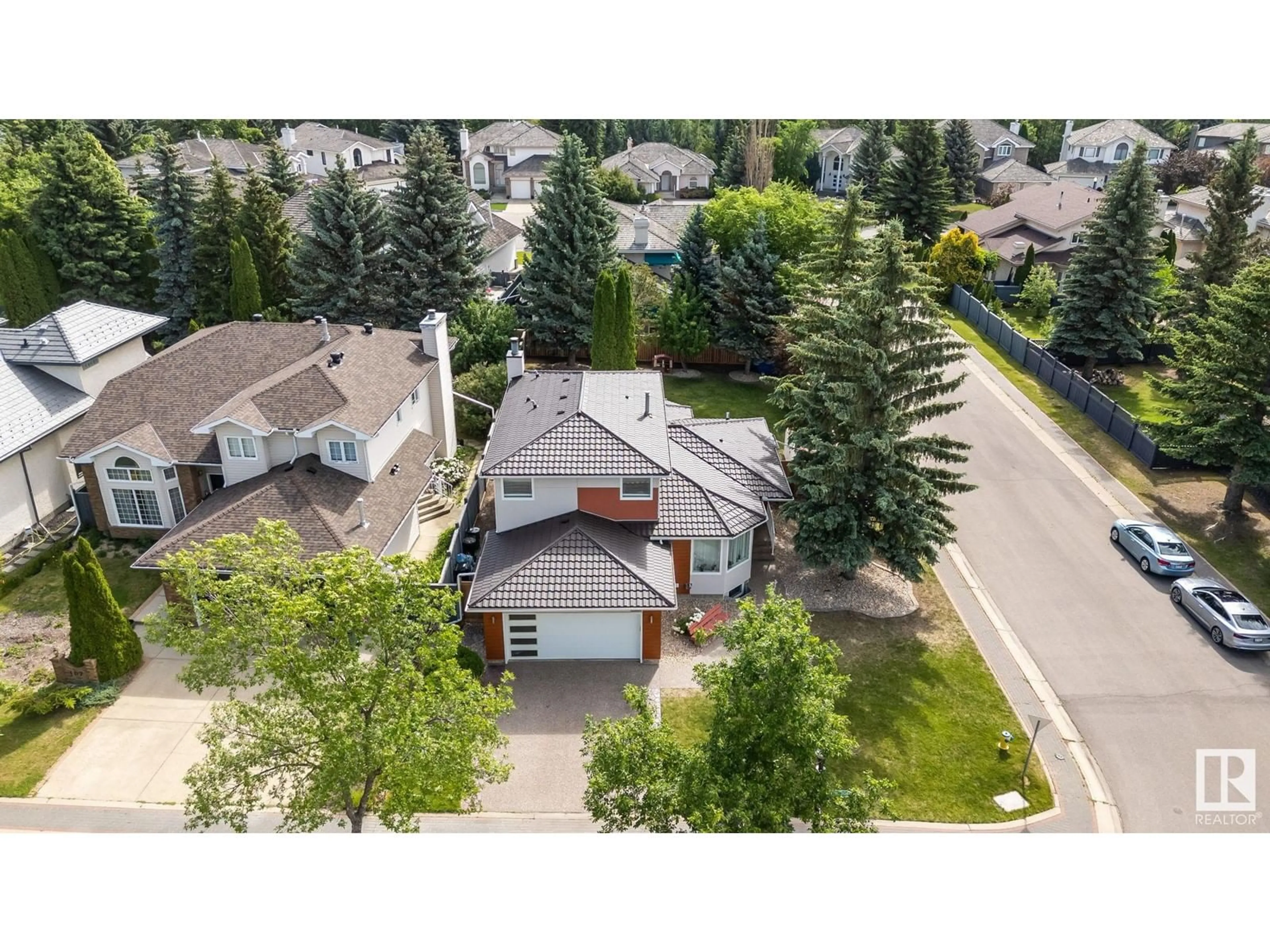 A pic from outside/outdoor area/front of a property/back of a property/a pic from drone, street for 103 Wilkin RD NW, Edmonton Alberta T6M2H4