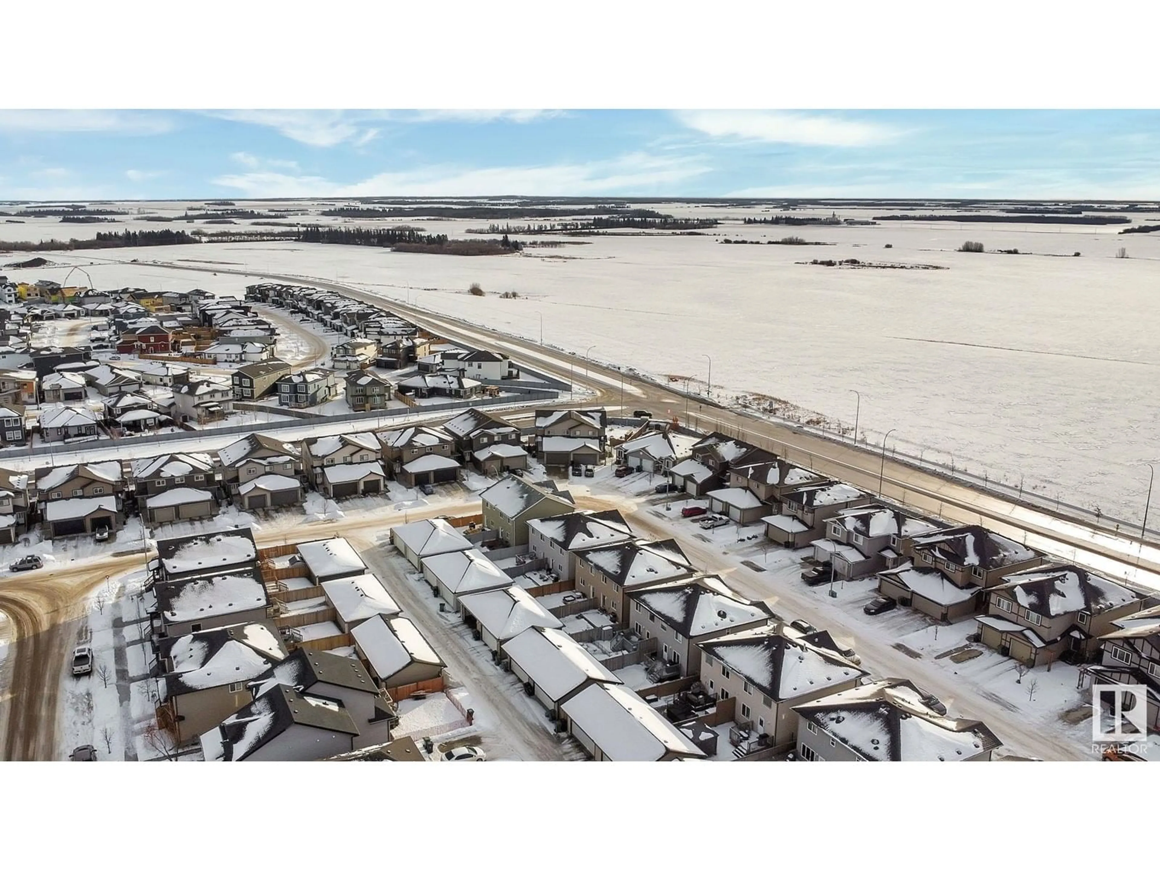 A pic from outside/outdoor area/front of a property/back of a property/a pic from drone, unknown for 73 RICHMOND LI, Fort Saskatchewan Alberta T8L0S2