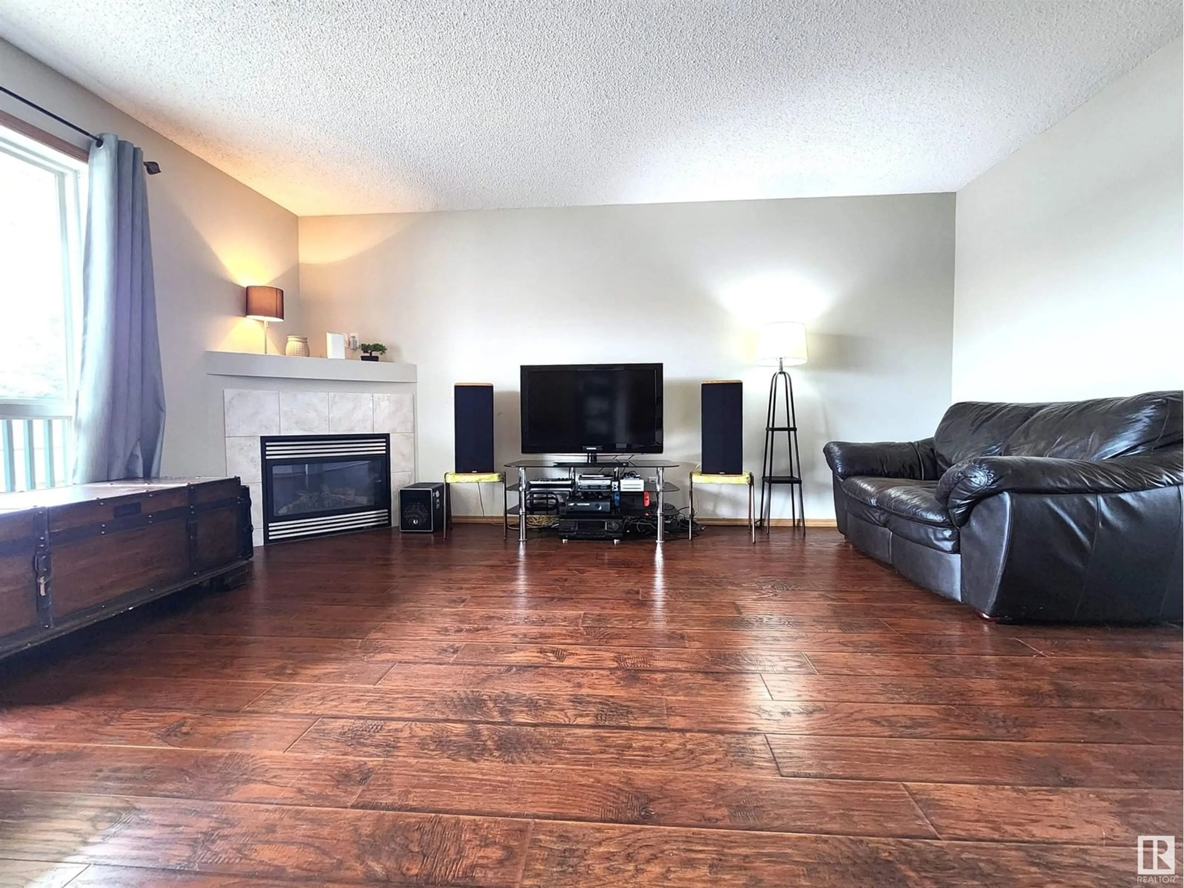 Living room with furniture, wood/laminate floor for #71 10909 106 ST NW, Edmonton Alberta T5H4M7