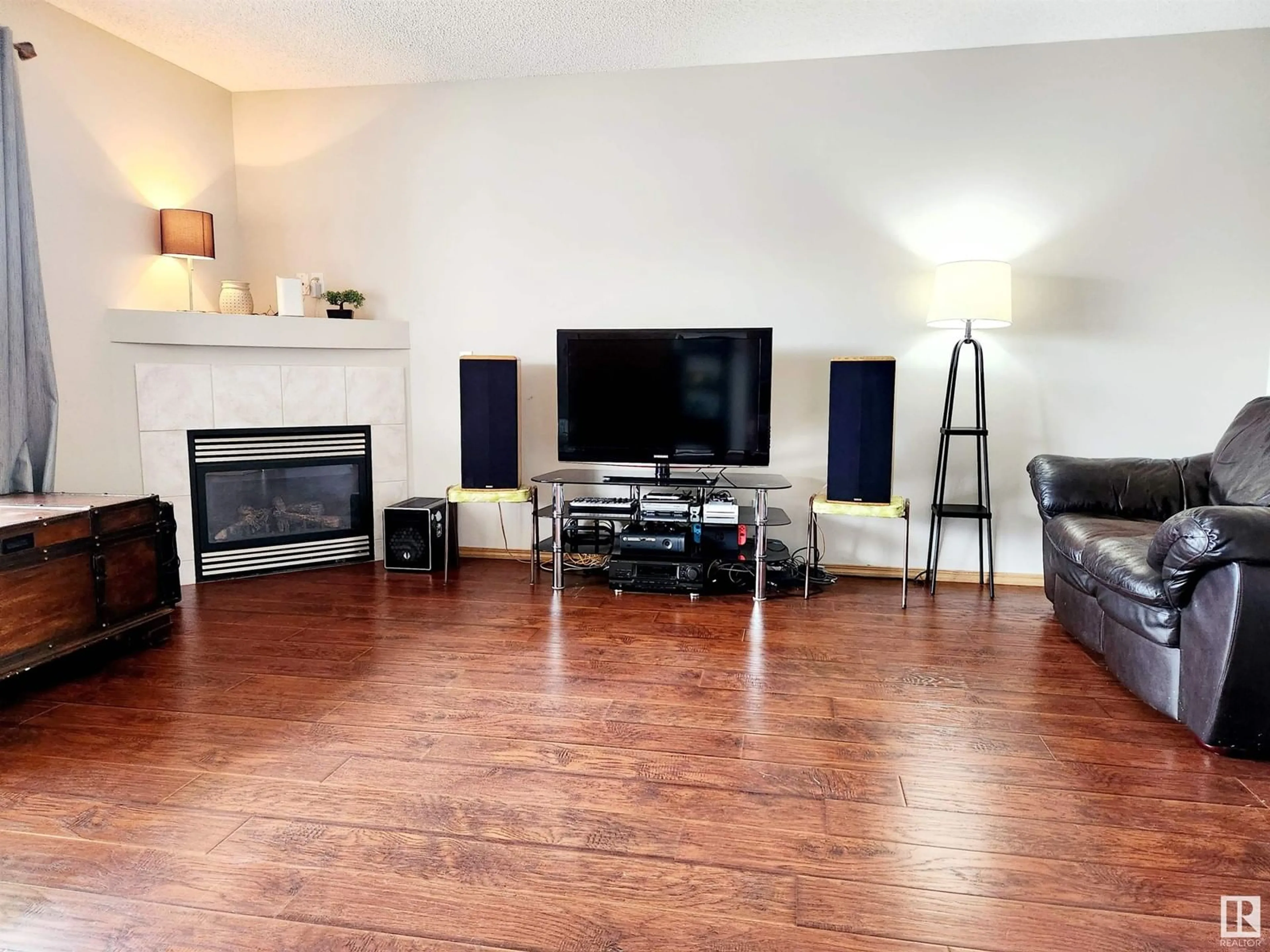 Living room with furniture, wood/laminate floor for #71 10909 106 ST NW, Edmonton Alberta T5H4M7