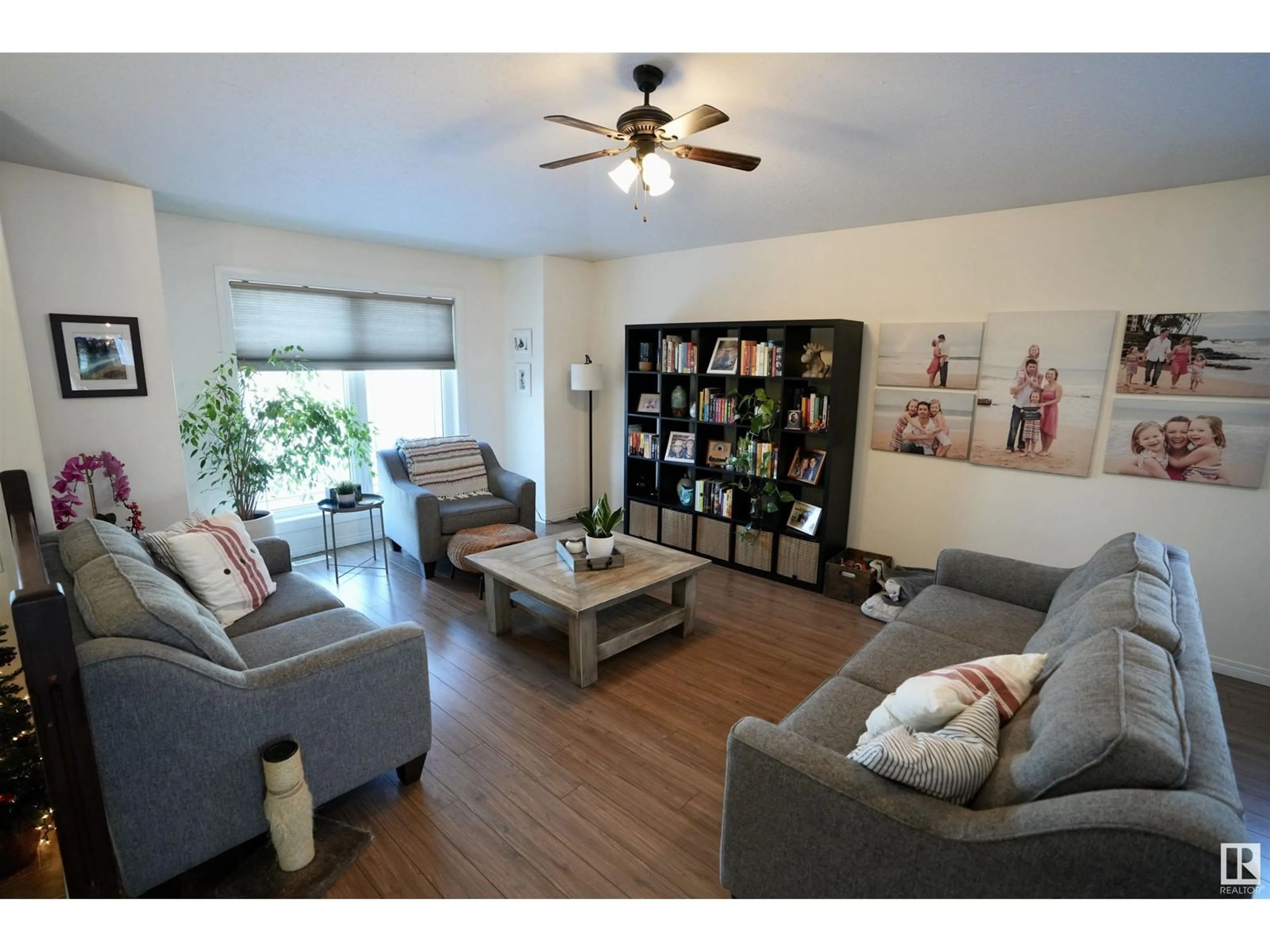 Living room with furniture, wood/laminate floor for 5605 48 AV, St. Paul Town Alberta T0A3A1