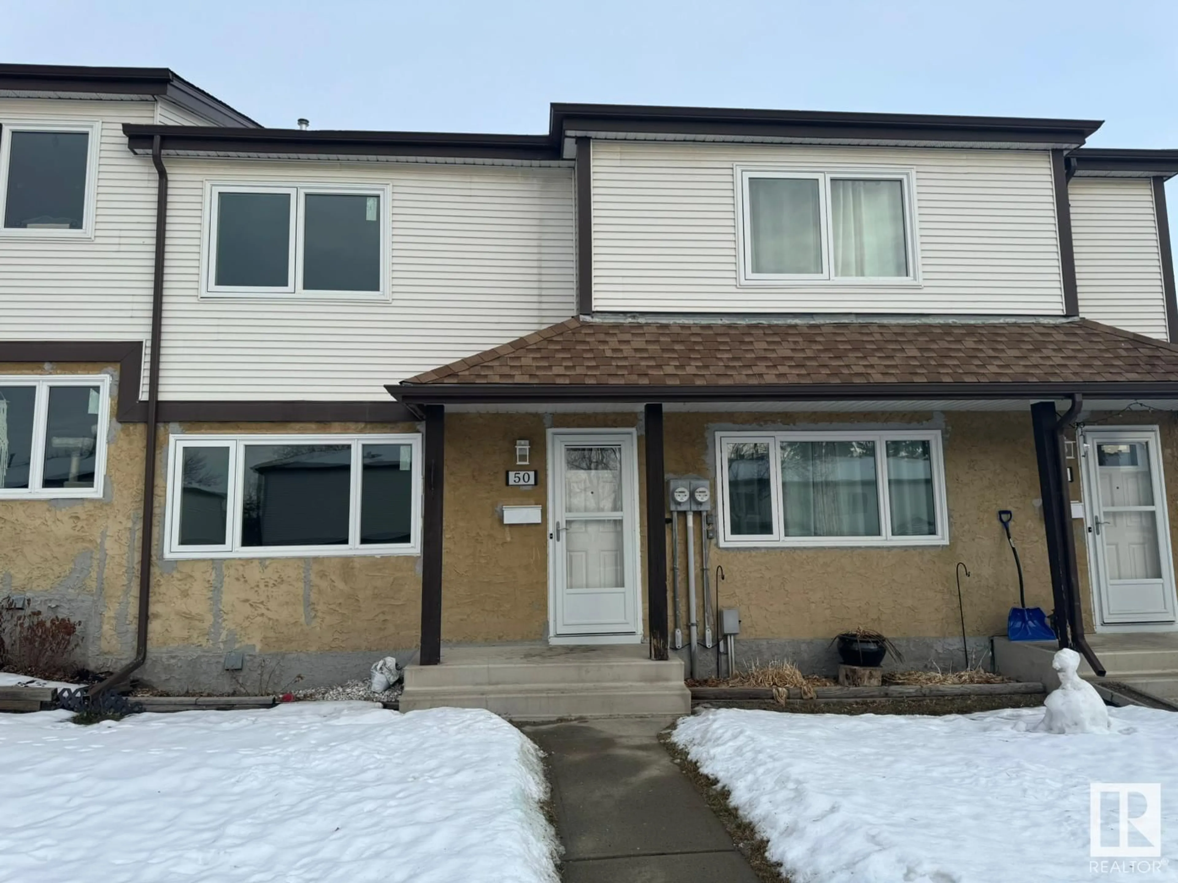 Home with vinyl exterior material, street for #50 14511 52 ST NW, Edmonton Alberta T5A4M6