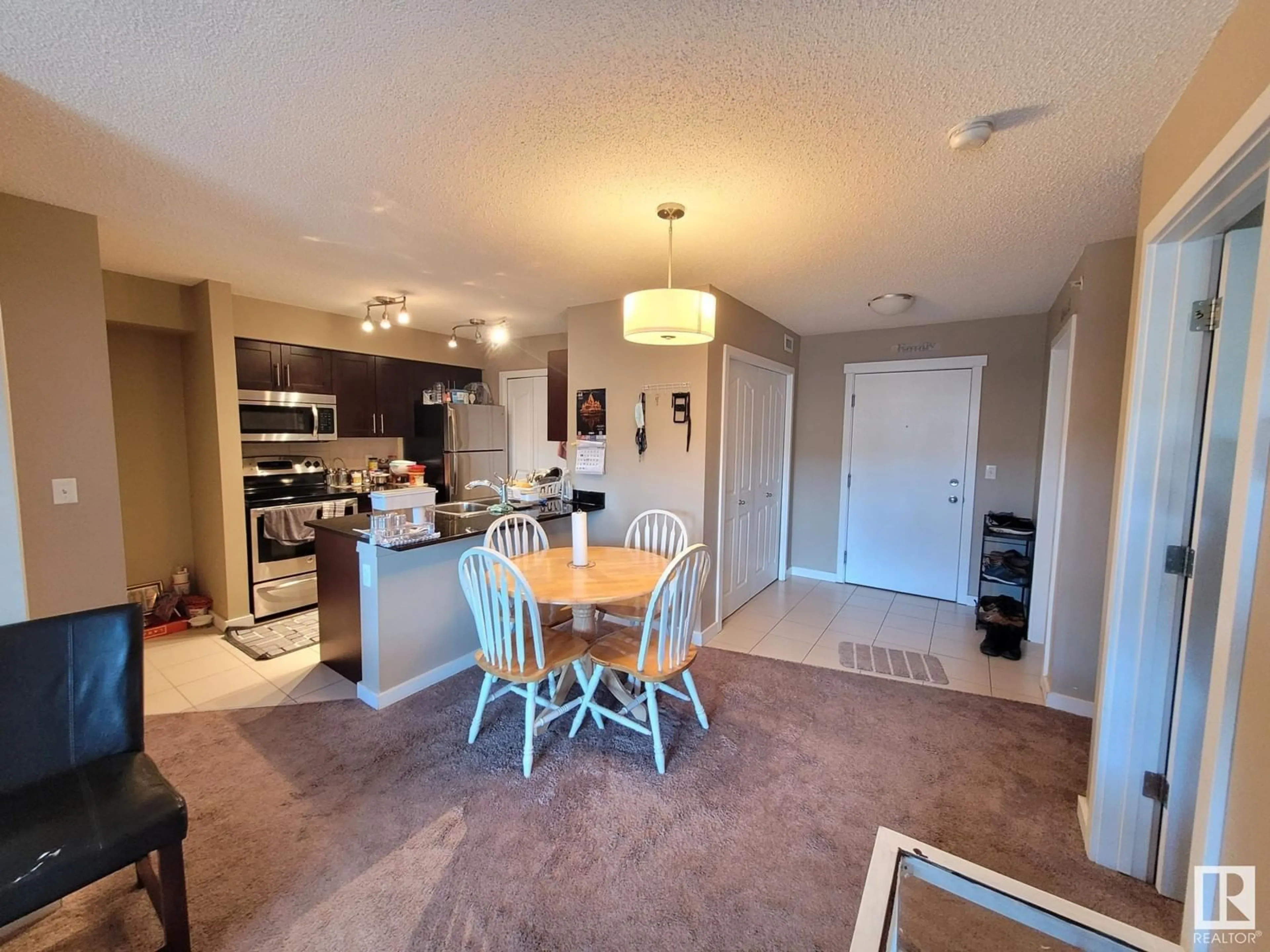 Open concept kitchen, unknown for #407 12025 22 AV SW, Edmonton Alberta T6W2Y1