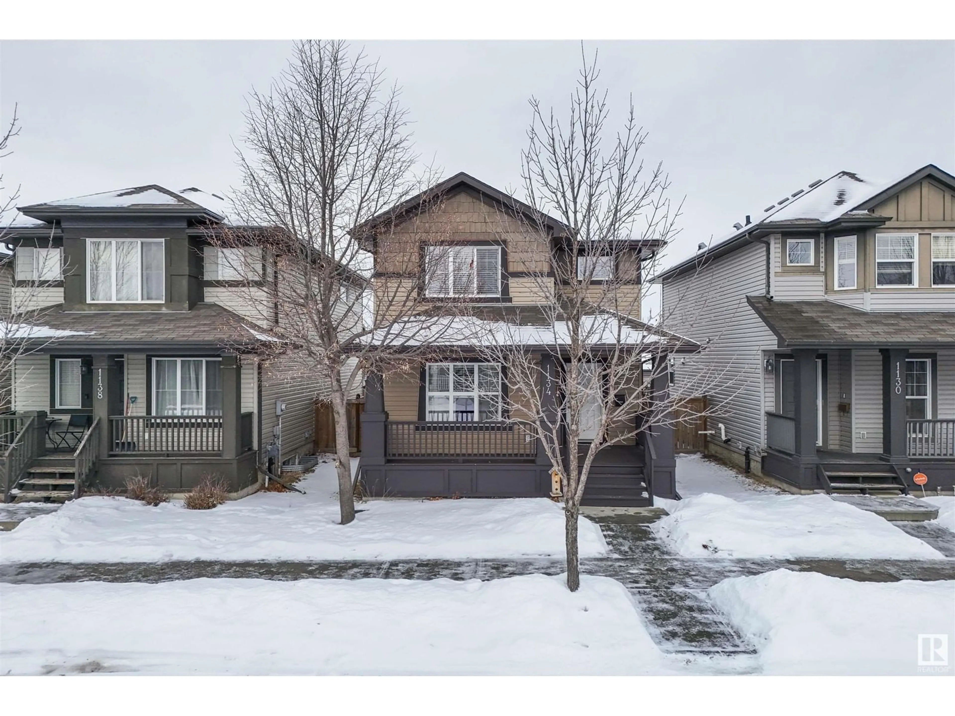 A pic from outside/outdoor area/front of a property/back of a property/a pic from drone, street for 1134 35A AV NW, Edmonton Alberta T6T0J7